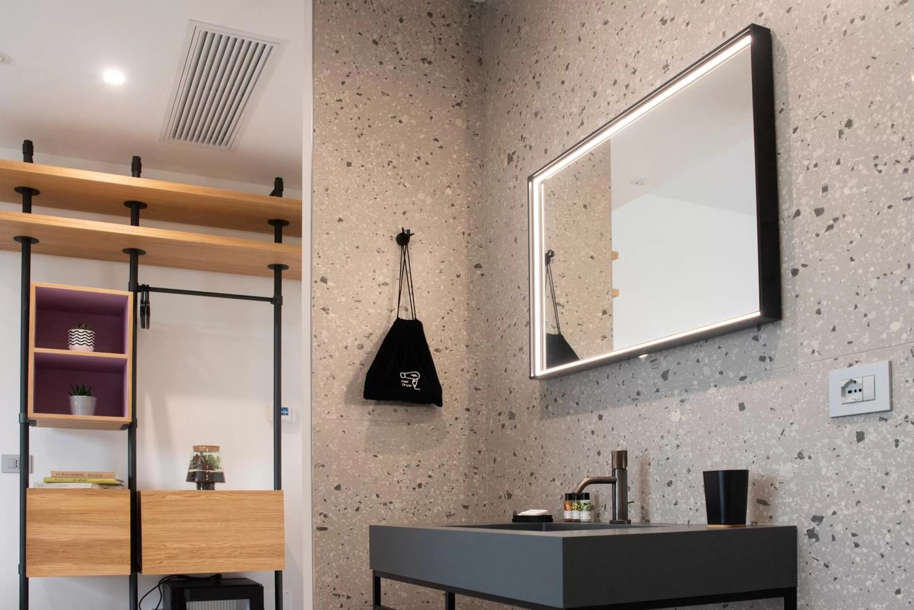 Bathroom in Lisetta Gardens Boutique & Suites