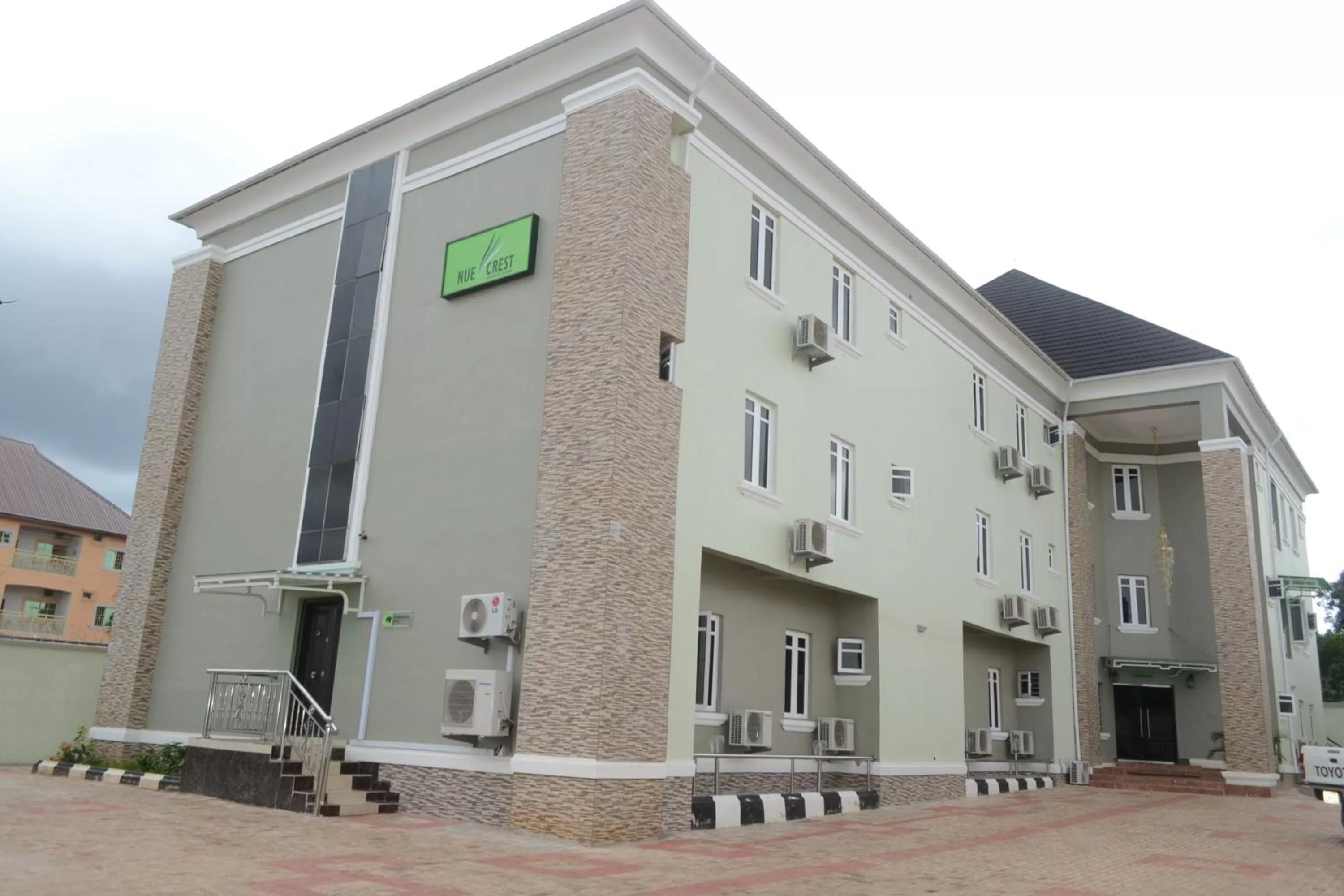 Property building in Nue-Crest Hotels & Suites