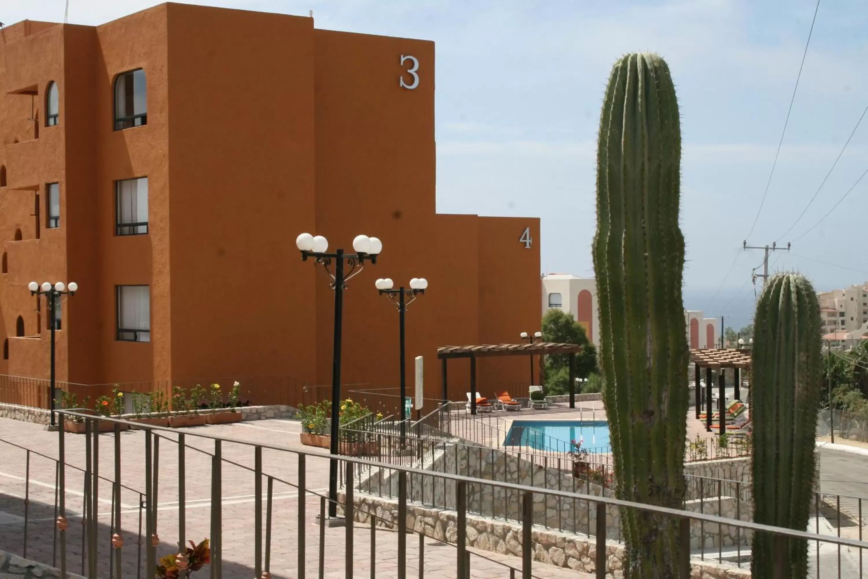 Facade/entrance, Pool View in Sunrock Hotel & Suites