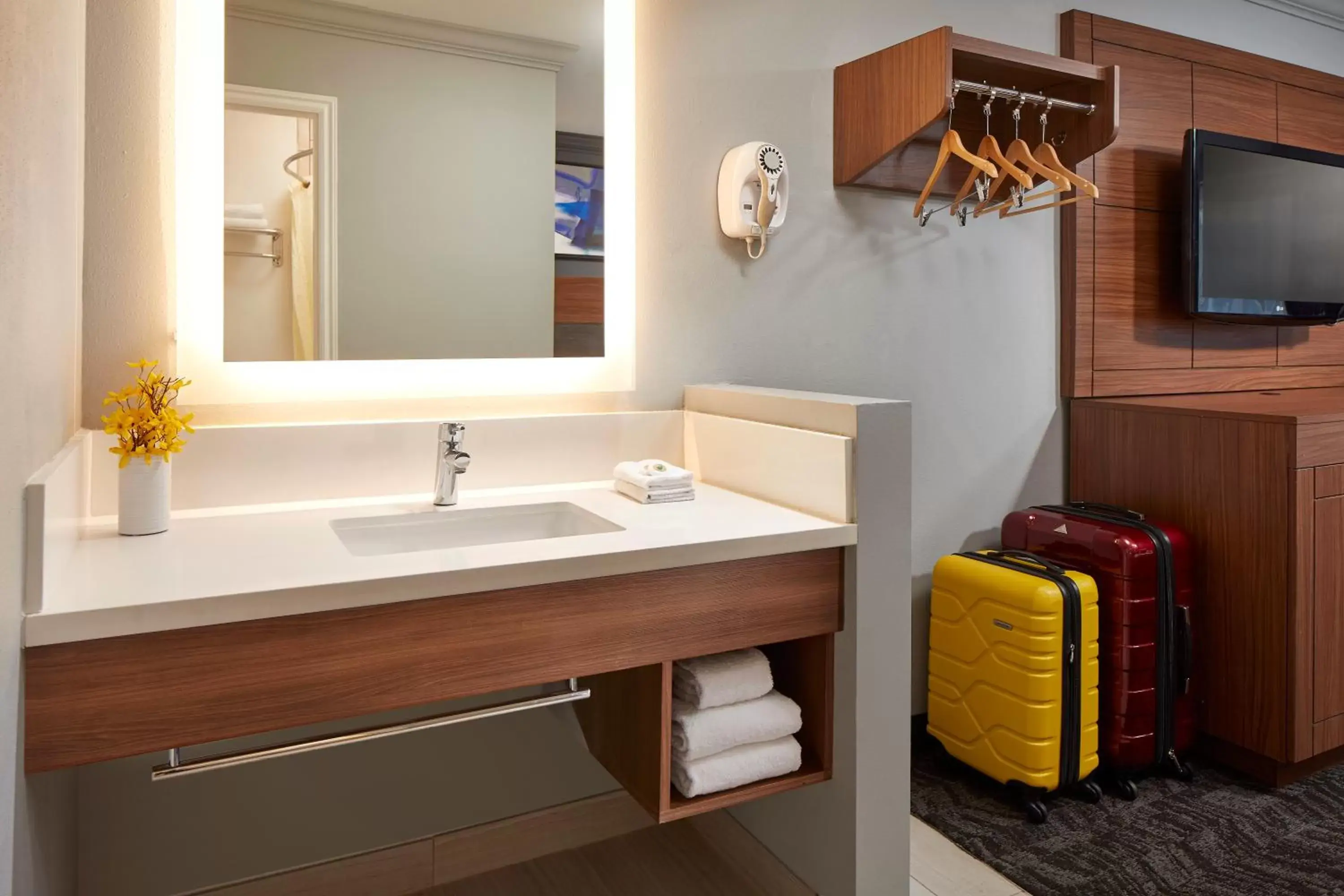 Toilet, Bathroom in Studio Inn & Suites at Promenade Downey