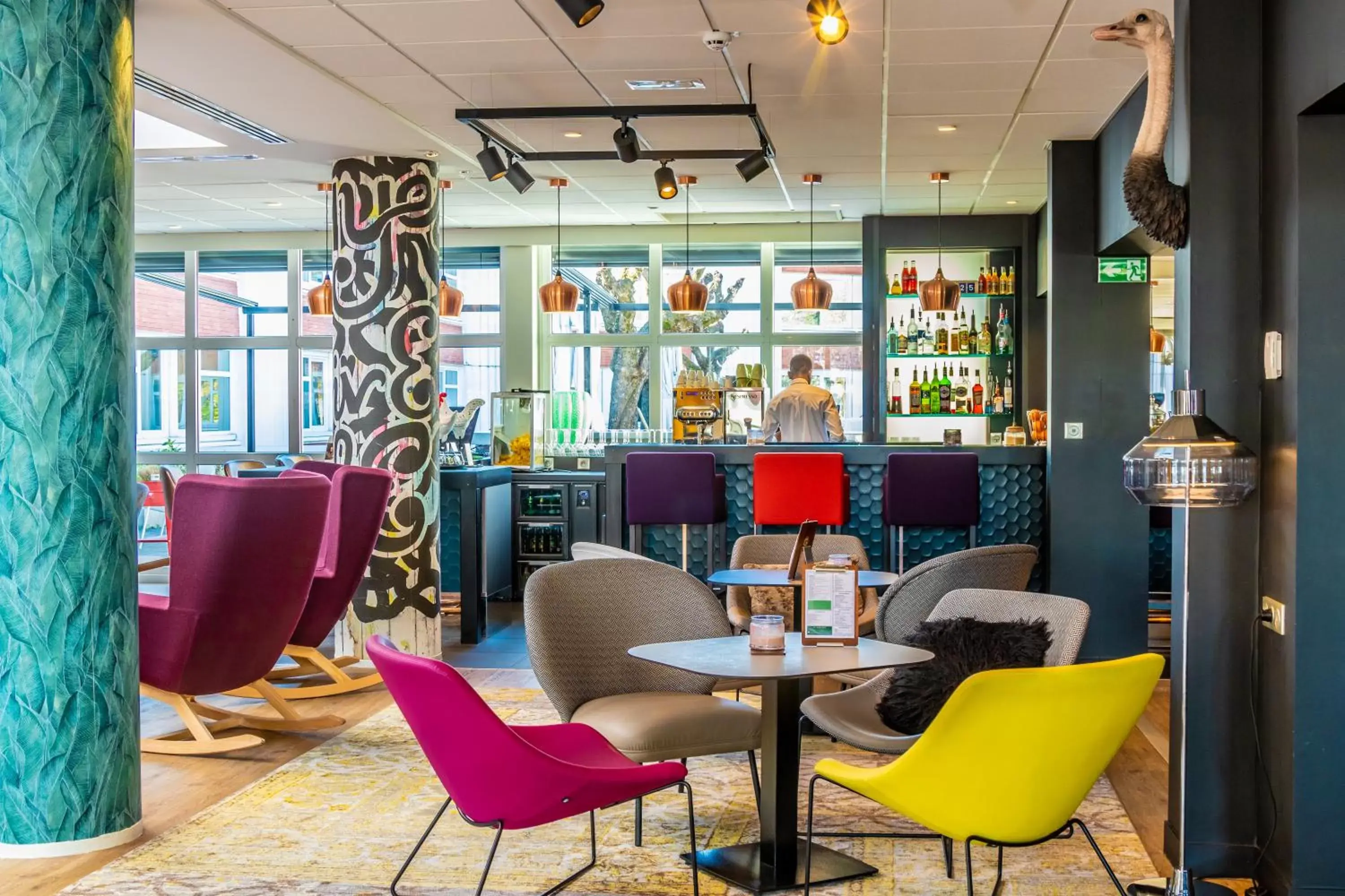 Lounge or bar in Novotel Lyon Bron Eurexpo