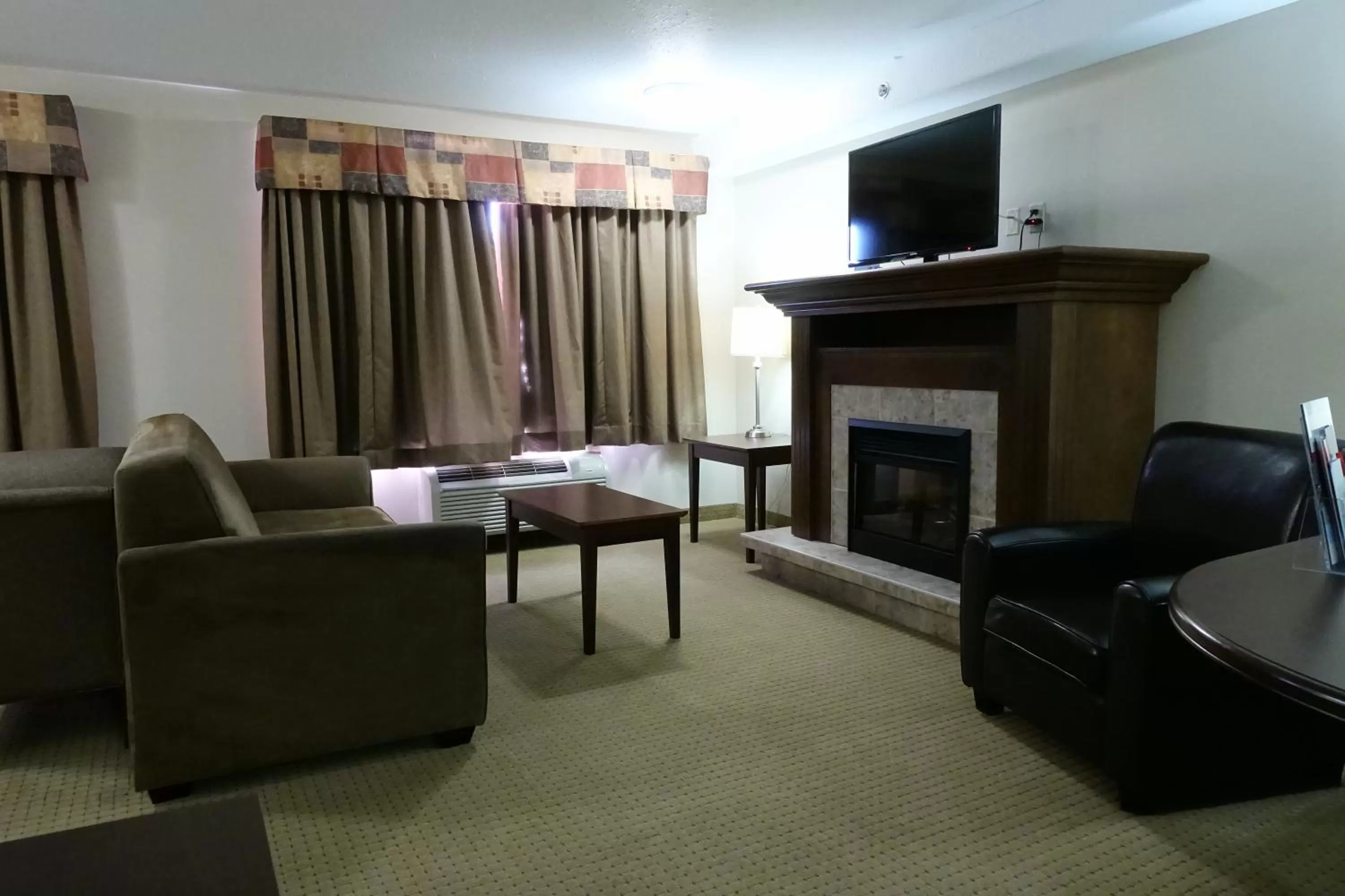 Seating area in Ramada by Wyndham Weyburn