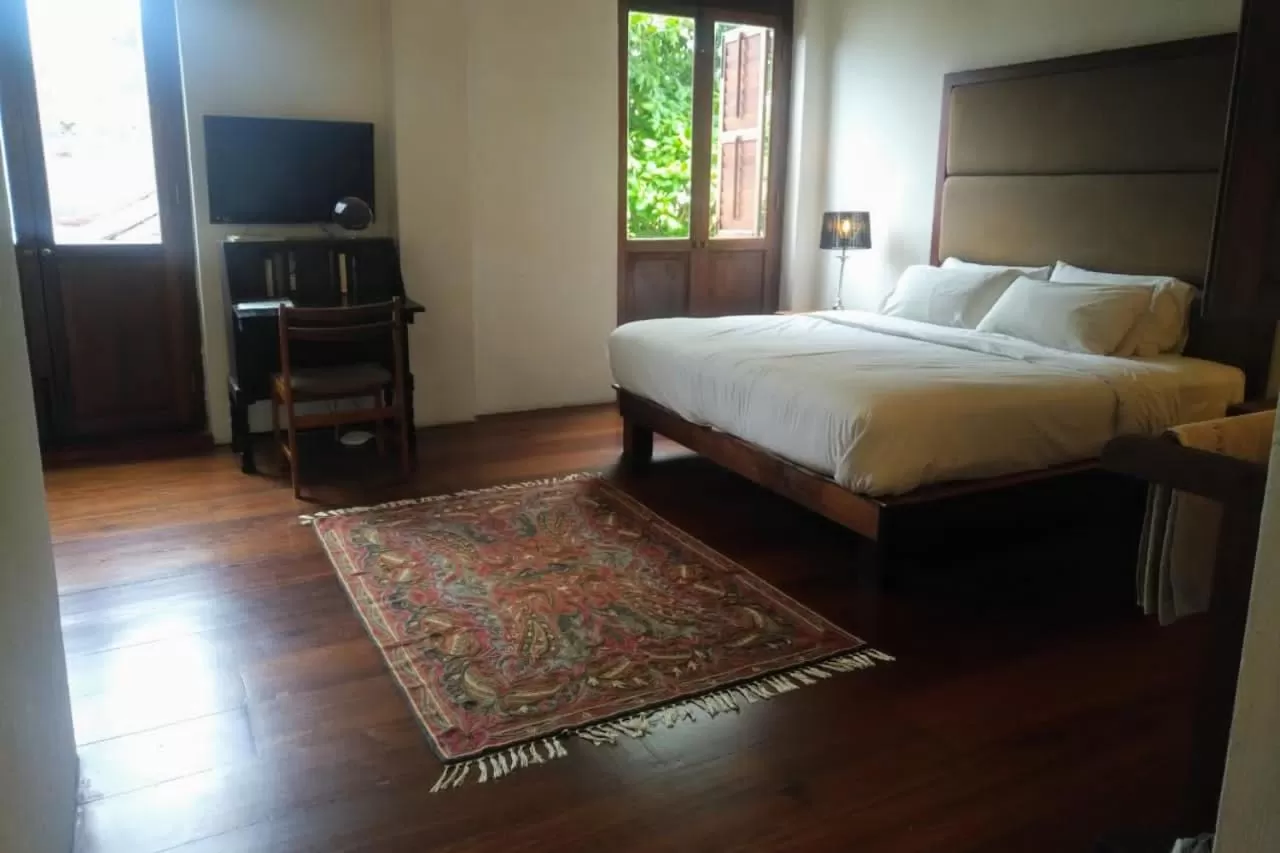 Bed in Ren I Tang Heritage Inn