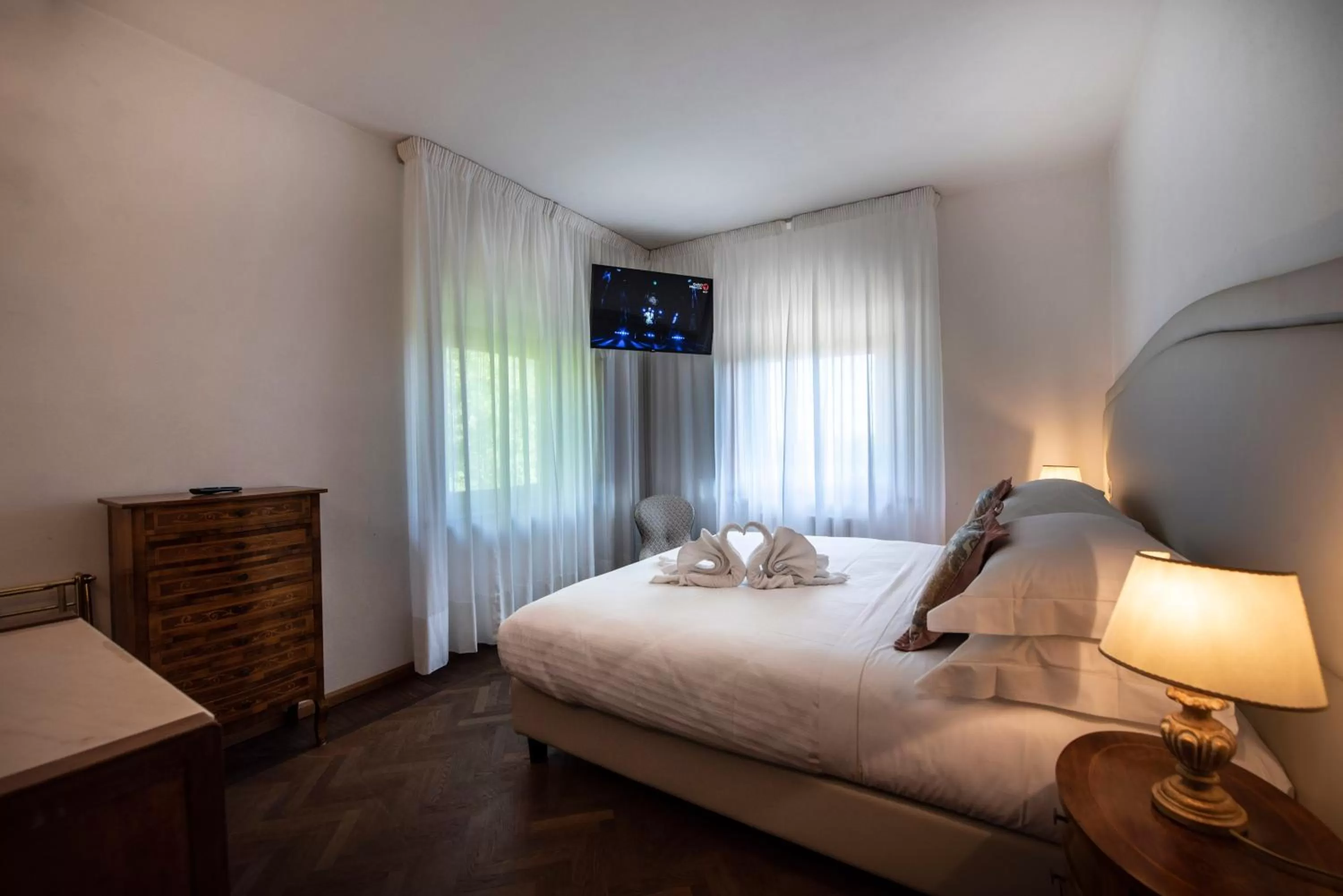 Bed in Villa Scacciapensieri Boutique Hotel