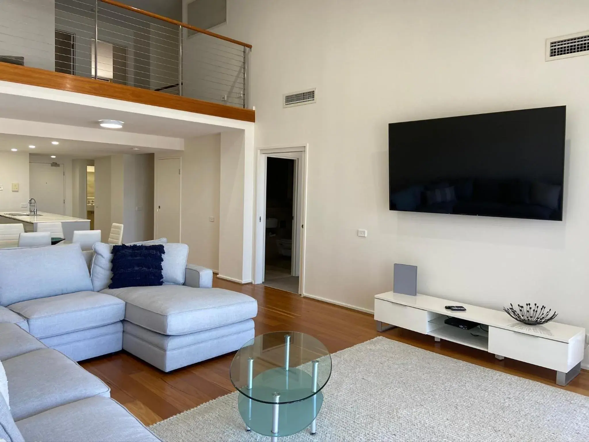 Living room, TV/Entertainment Center in Mantra Nelson Bay