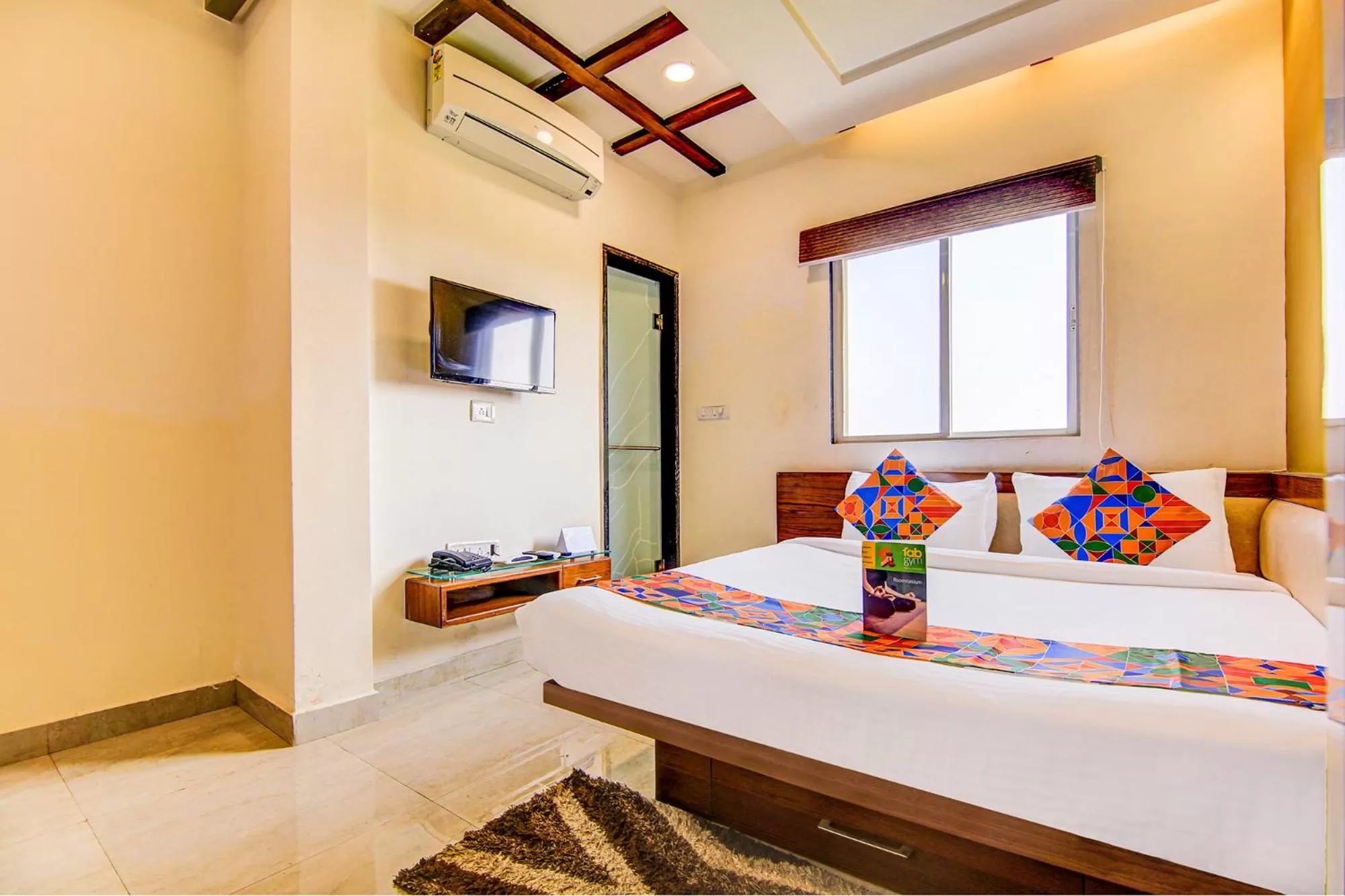 Bedroom in FabHotel The Khushi Regent