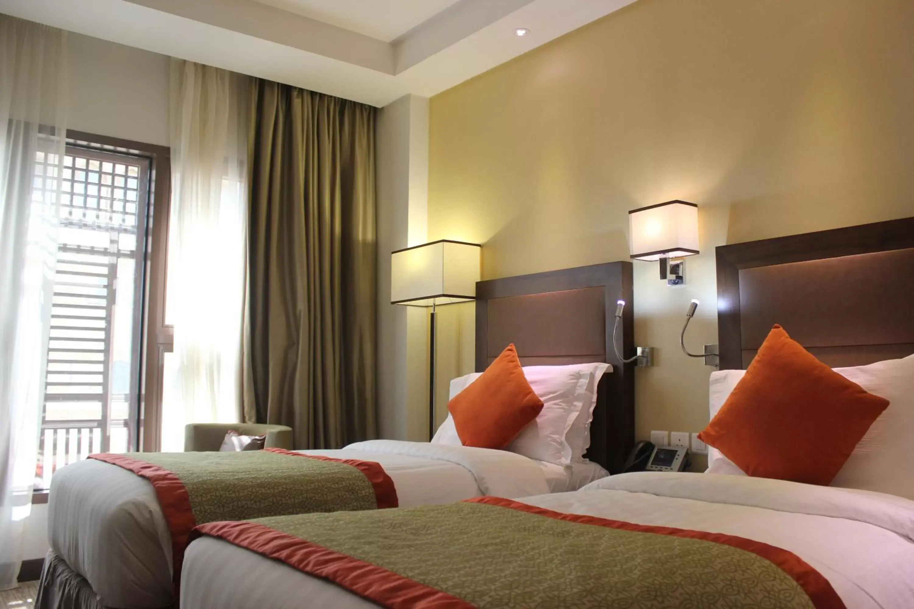 Photo of the whole room, Bed in Crowne Plaza Madinah, an IHG Hotel