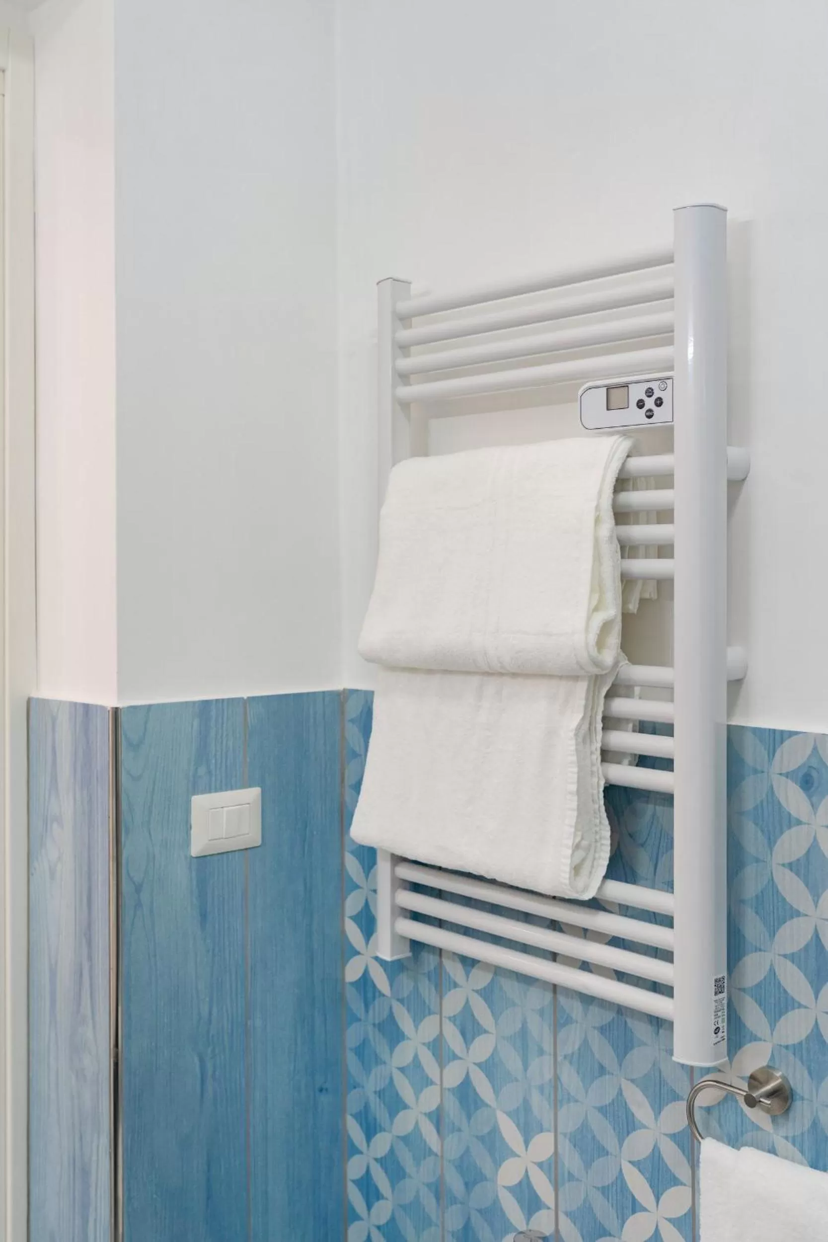 Bed in Poseidonia Rooms