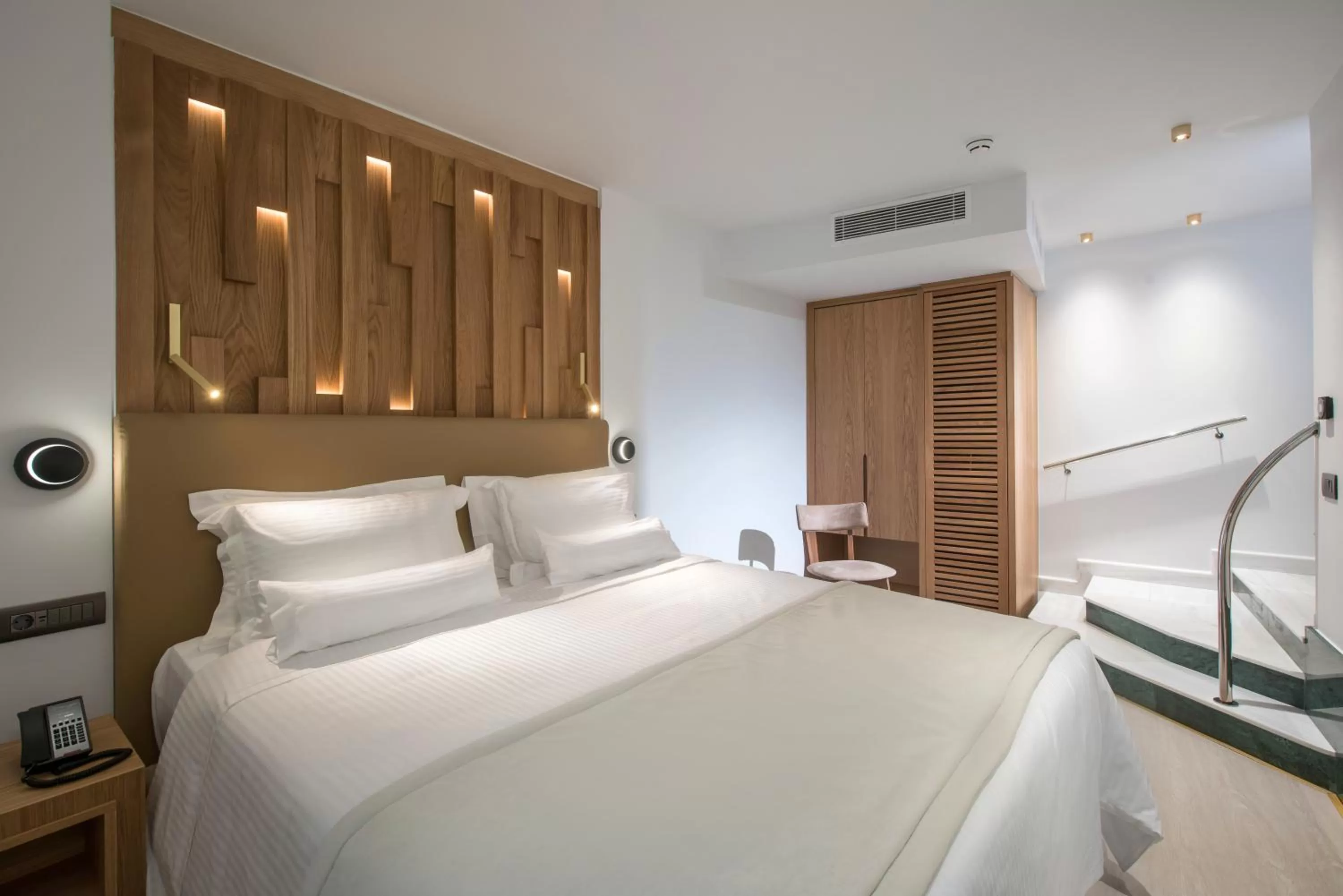 Bed in Dimargio Luxury Hotel & Spa