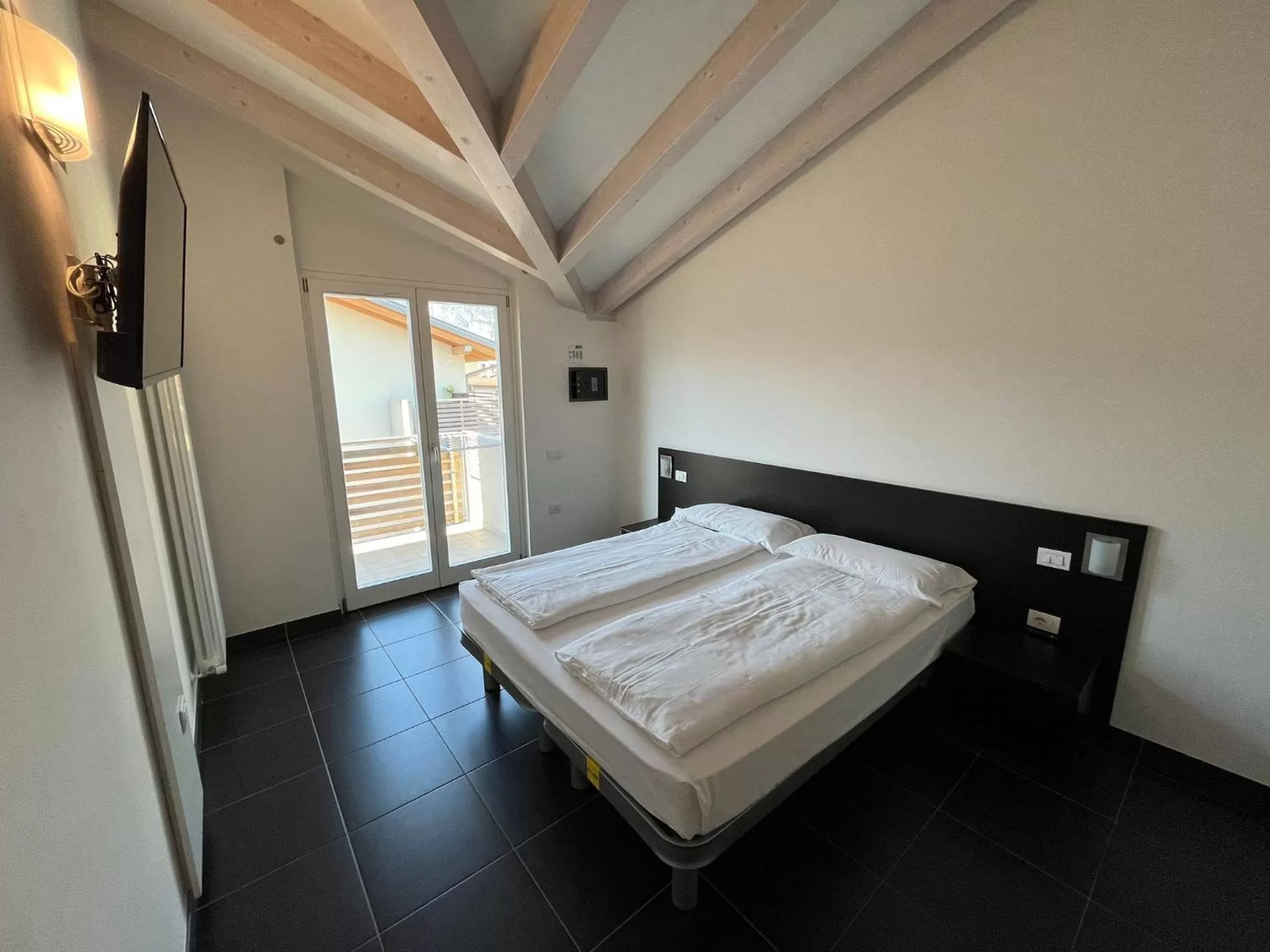 Bed in 4 Limoni Apartment Resort