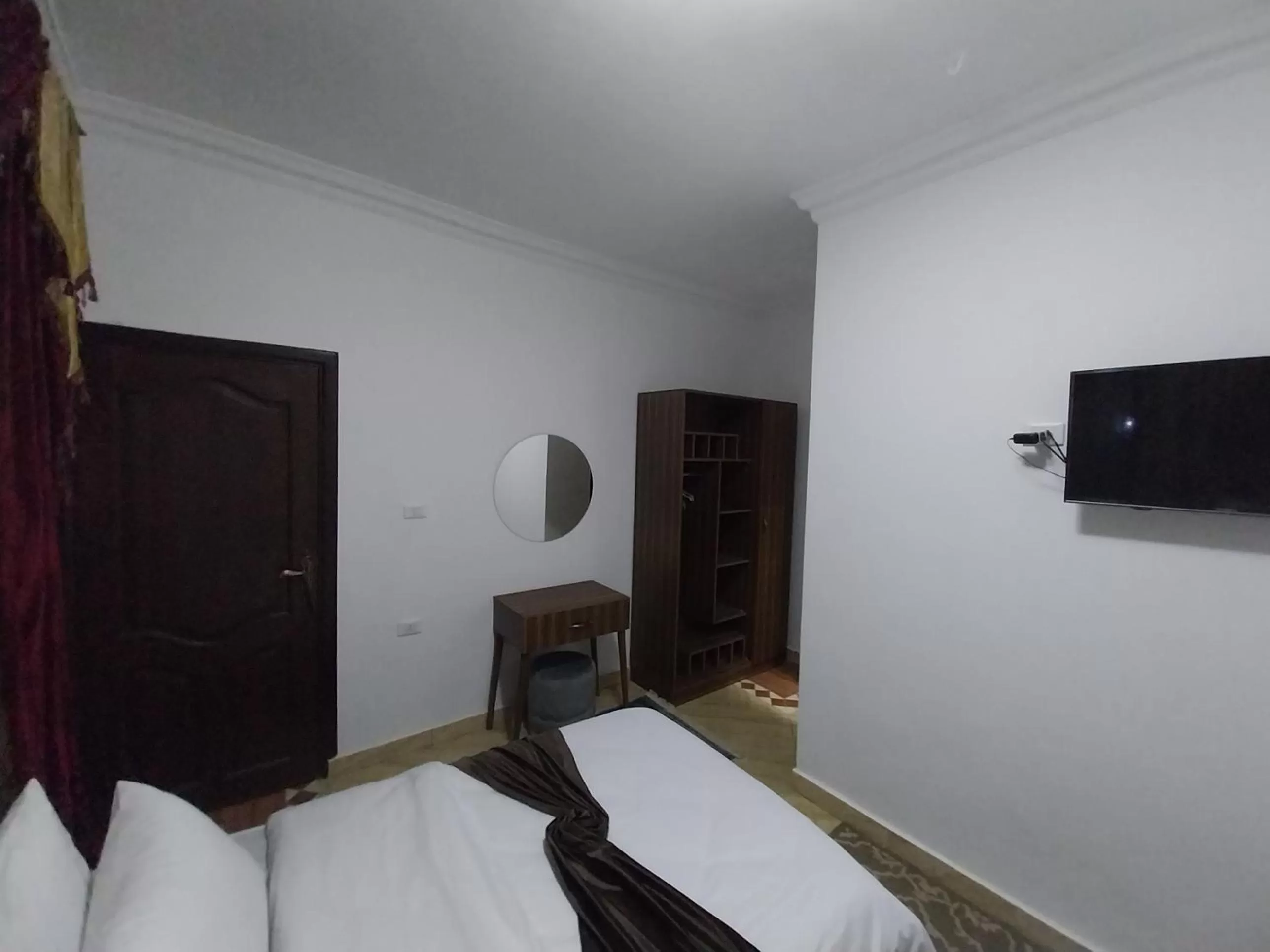 Bed, TV/Entertainment Center in Eagles Pyramids View