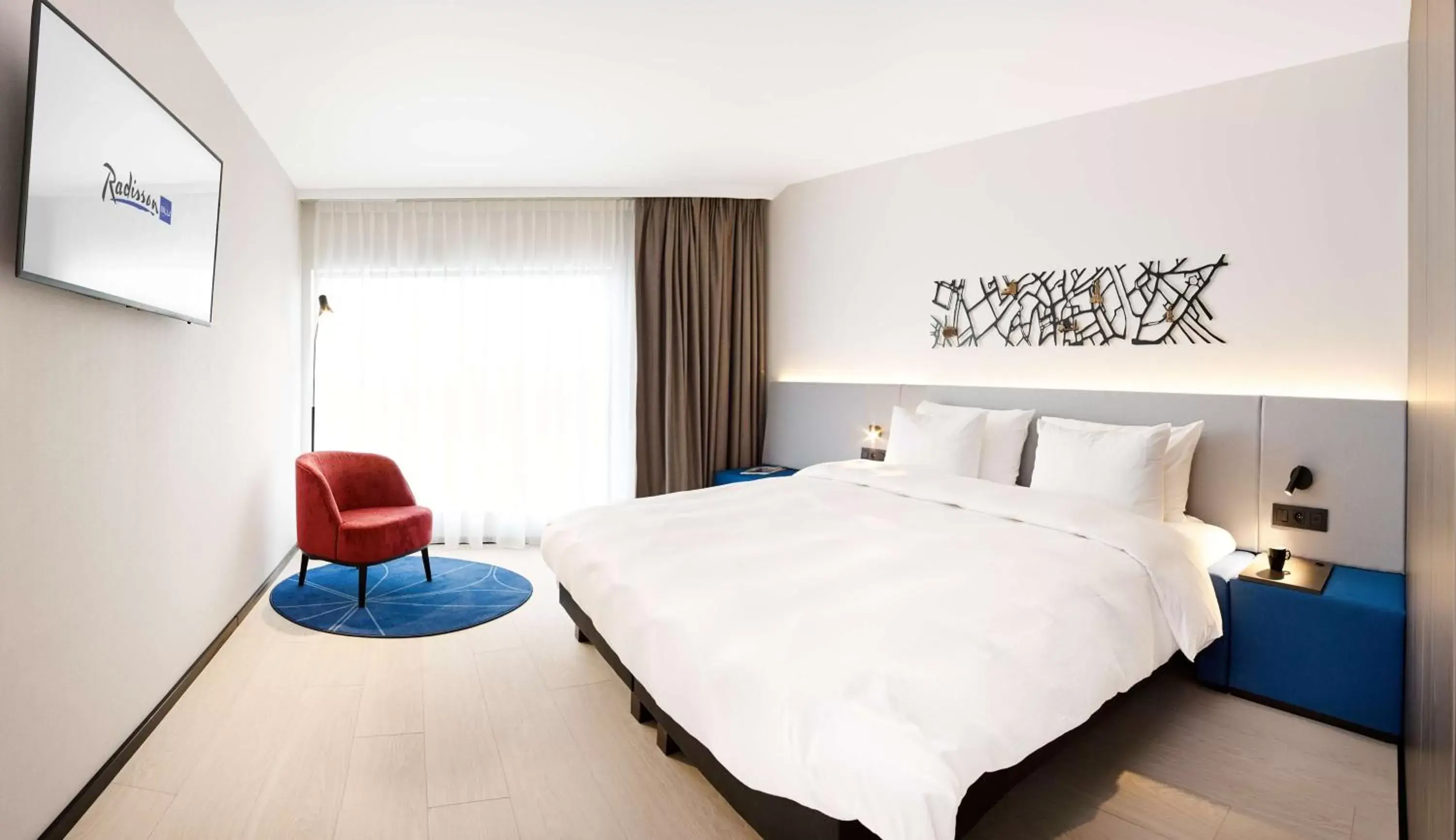 Photo of the whole room, Bed in Radisson Blu Hotel, Bruges