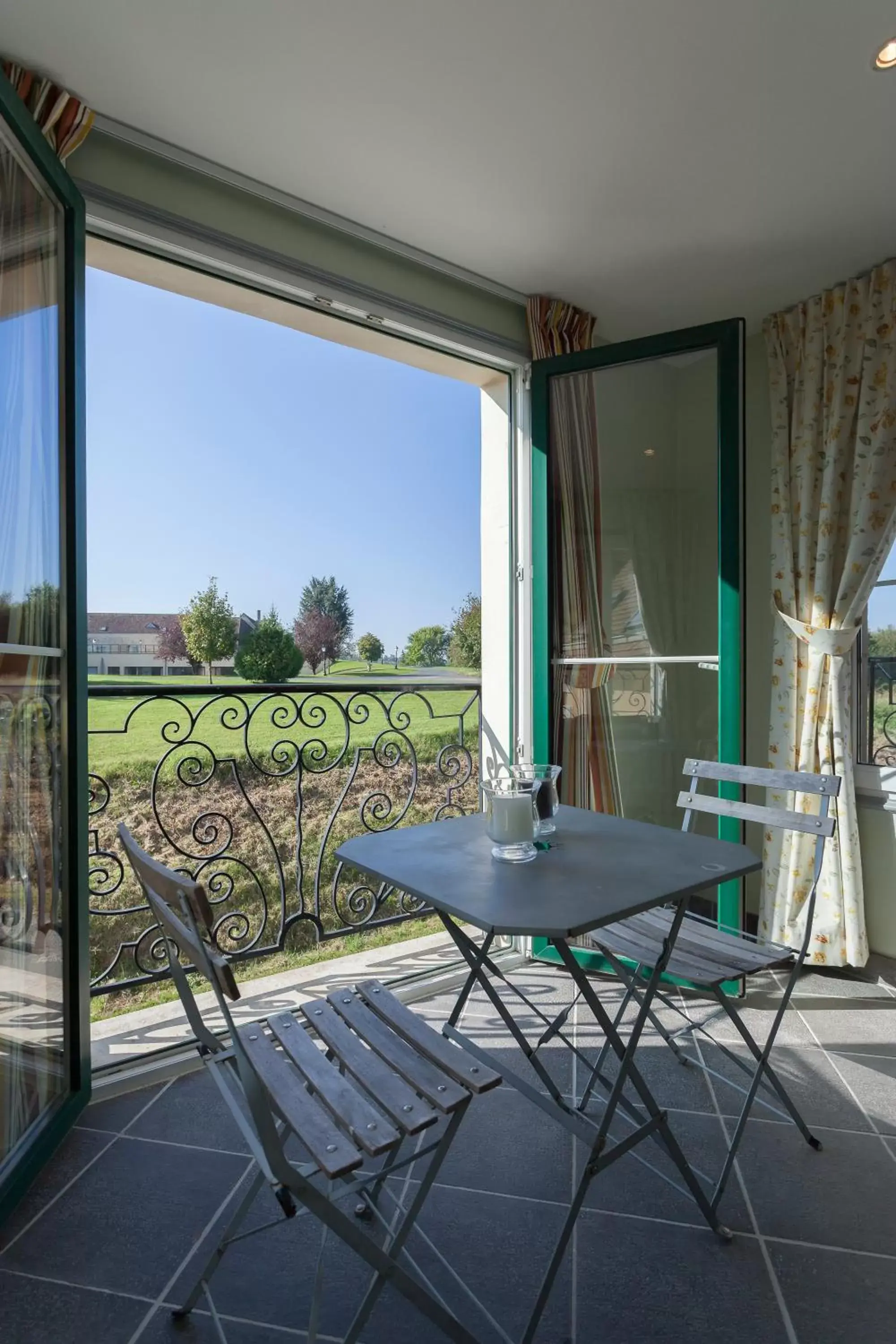 Balcony/Terrace in Hôtel Résidence Normandy Country Club by Popinns