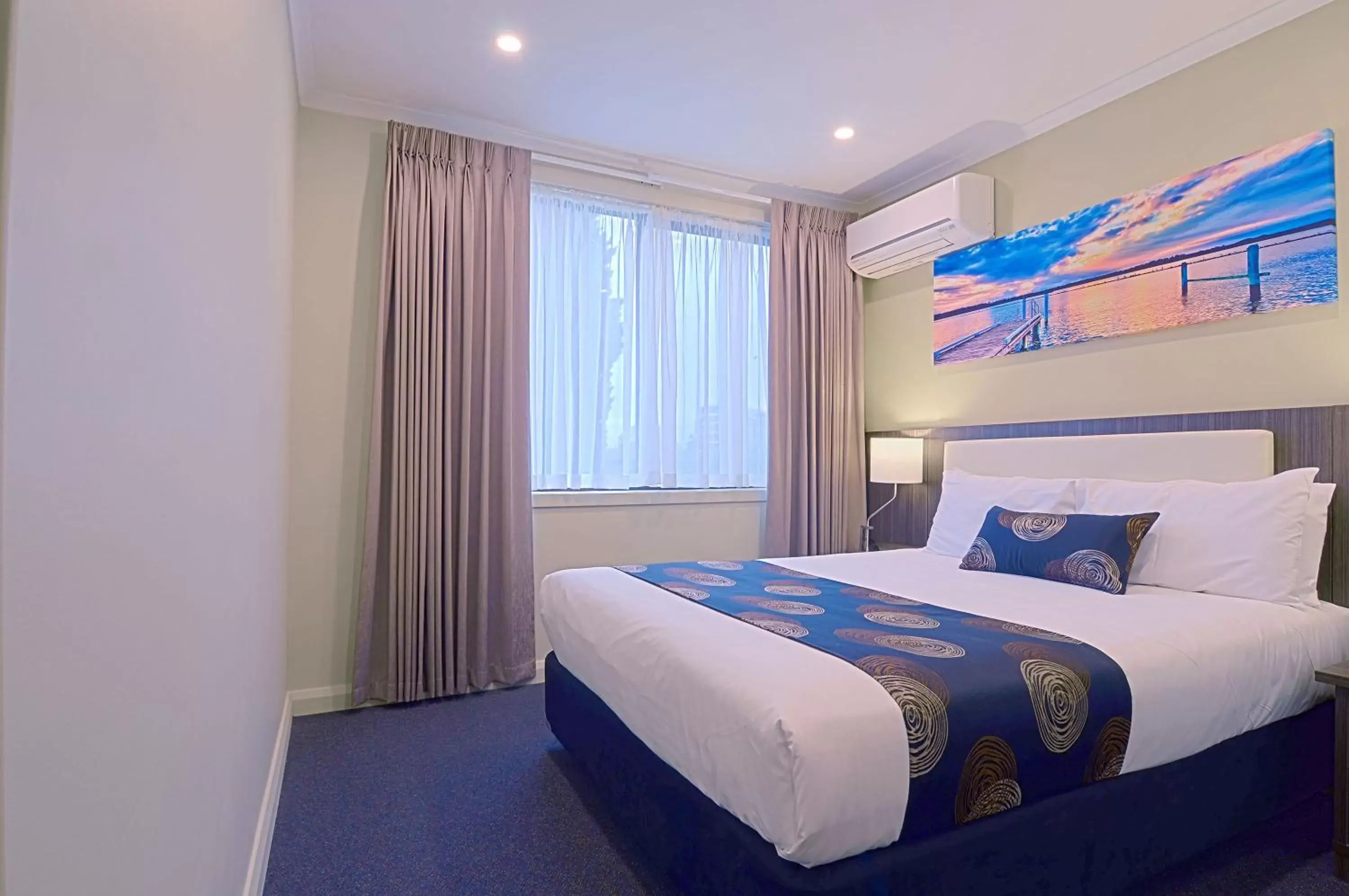 Bed in Park Squire Motor Inn & Serviced Apartments