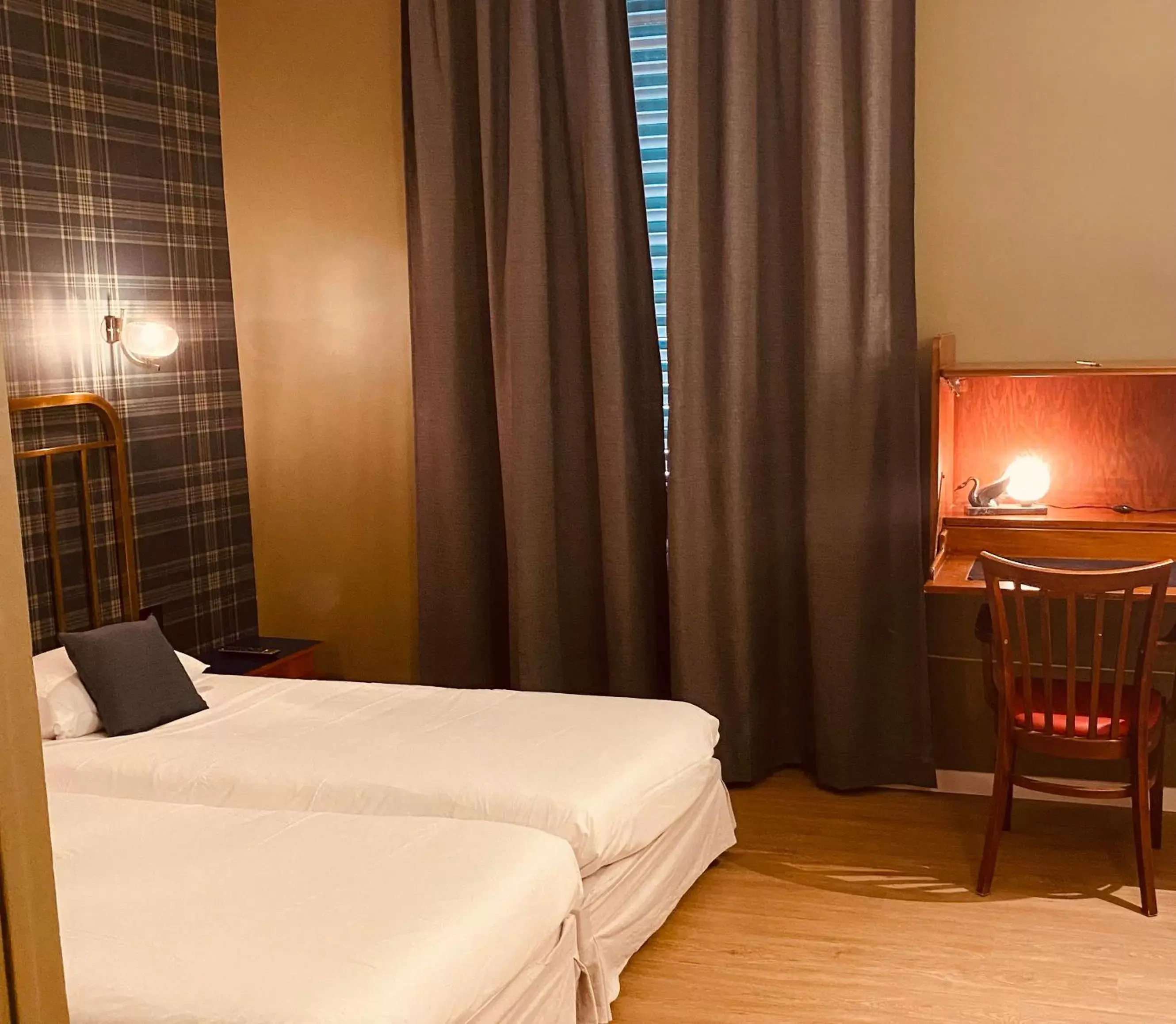 Bed in Grand Hotel De La Poste - Lyon Sud - Vienne Bed in Grand Hotel De La Poste - Lyon Sud - Vienne