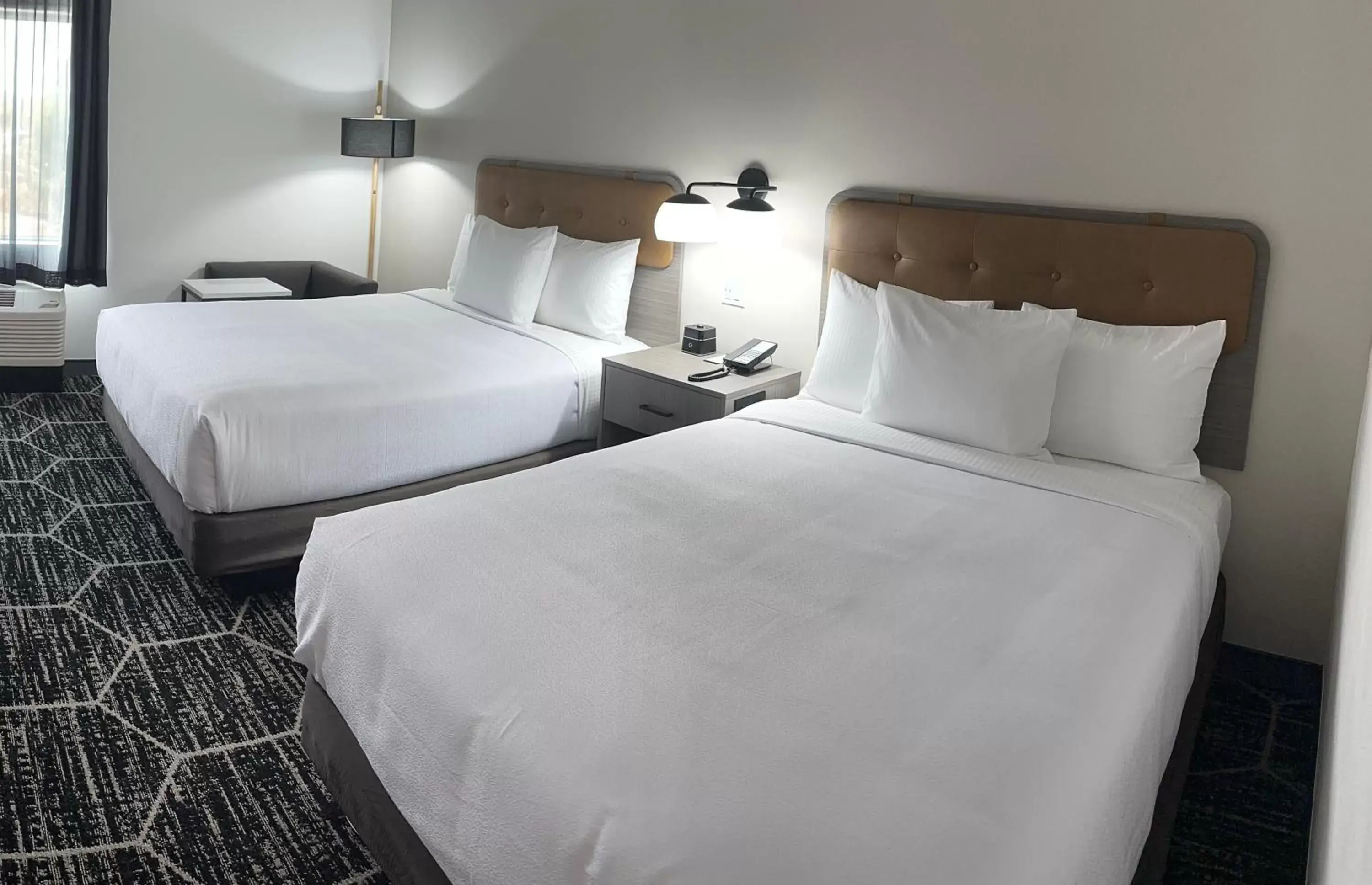 Bed in La Quinta Inn & Suites by Wyndham Yucaipa