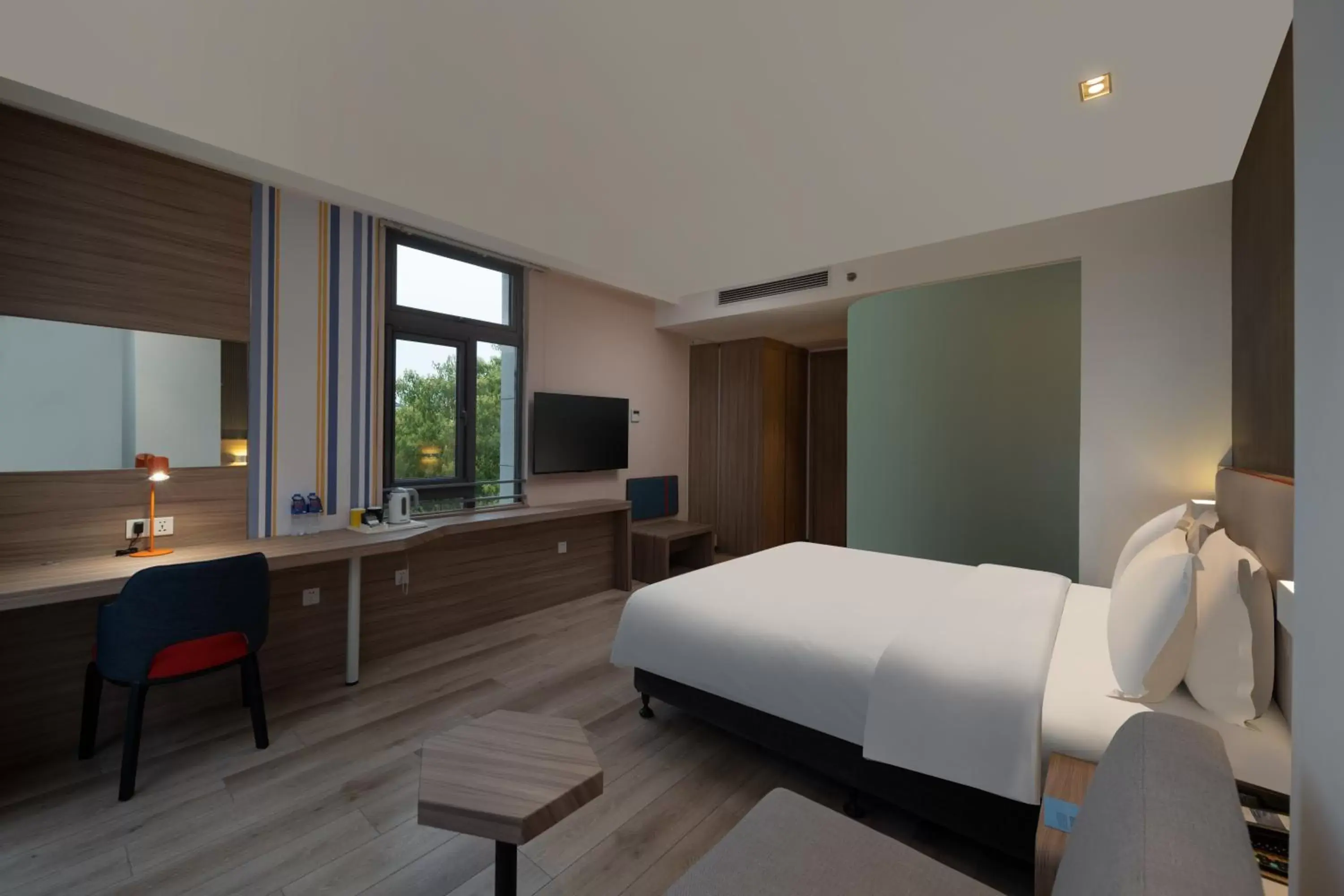 Bedroom in Holiday Inn Express Shanghai Pujiang, an IHG Hotel