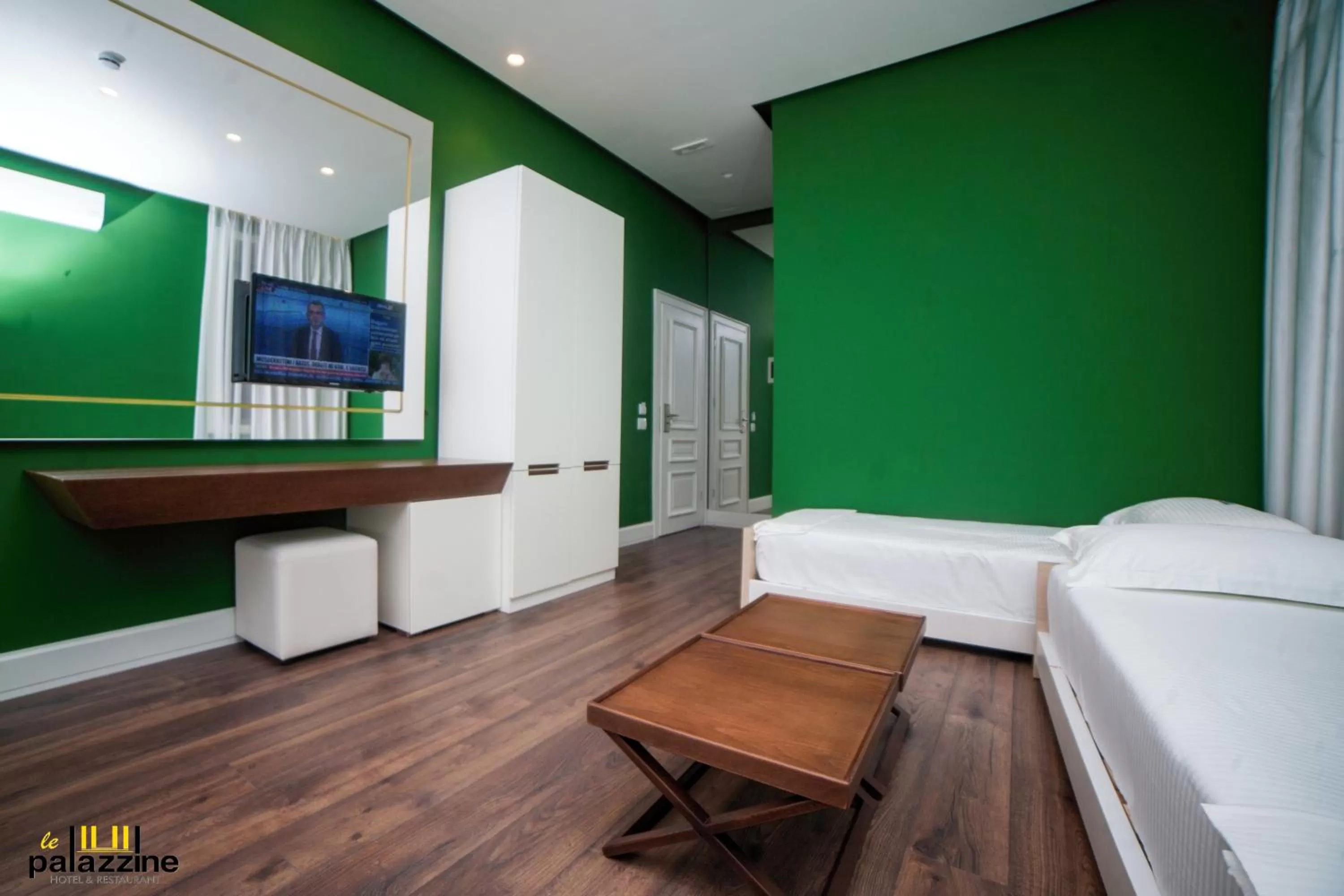 Bed in Le Palazzine Hotel