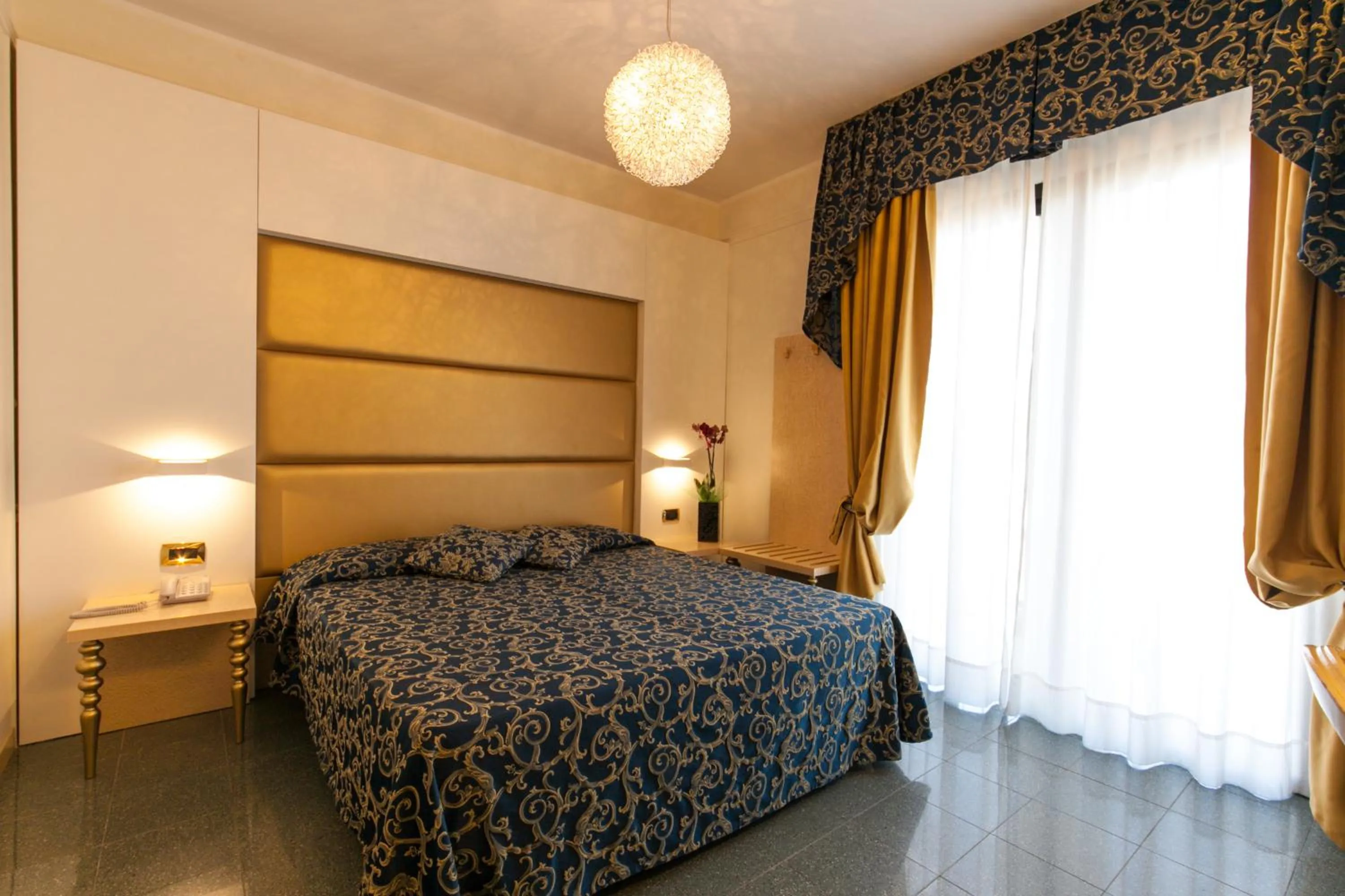 Bed in Hotel Ambassador