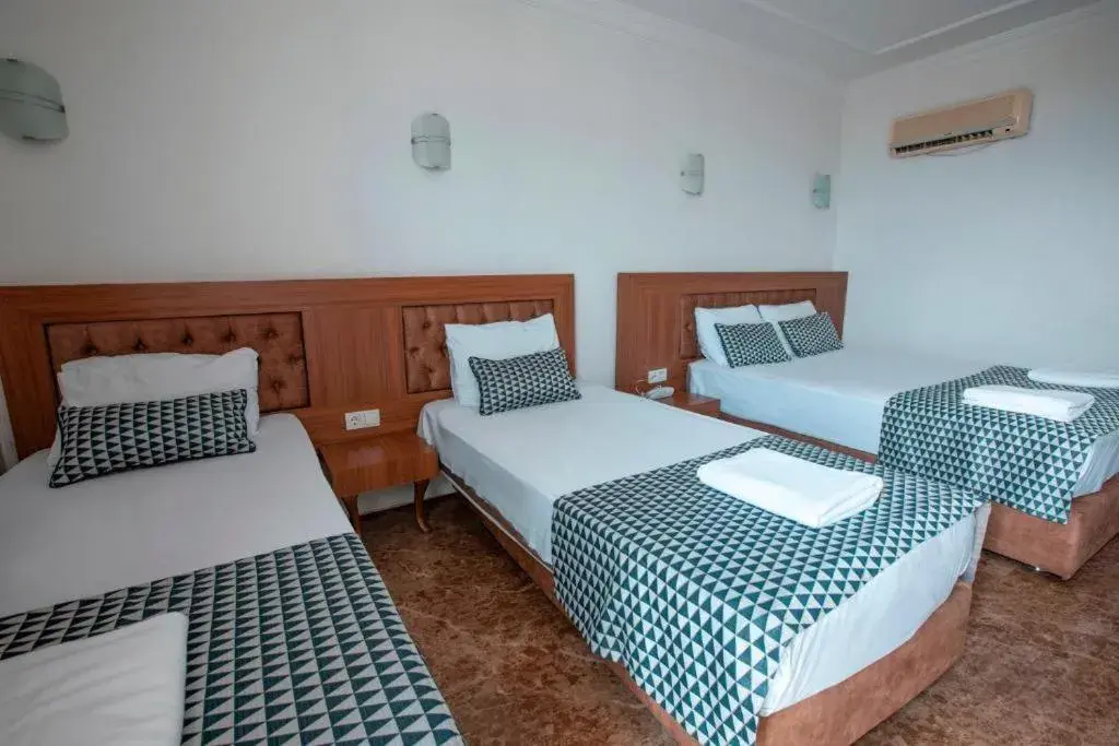 Bed in Kristal Beach Hotel