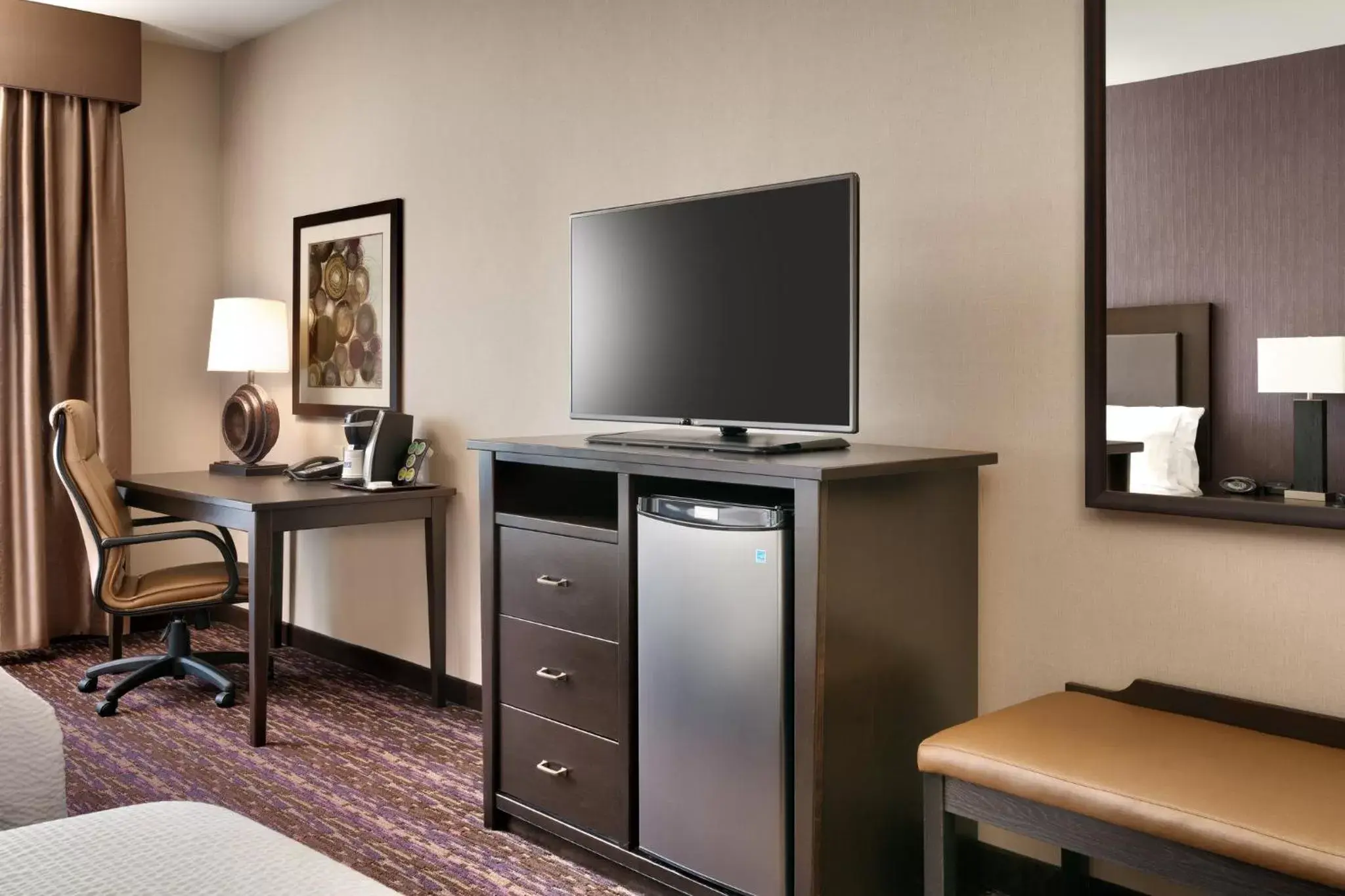 Photo of the whole room, TV/Entertainment Center in Holiday Inn Express Hotel & Suites Billings, an IHG Hotel