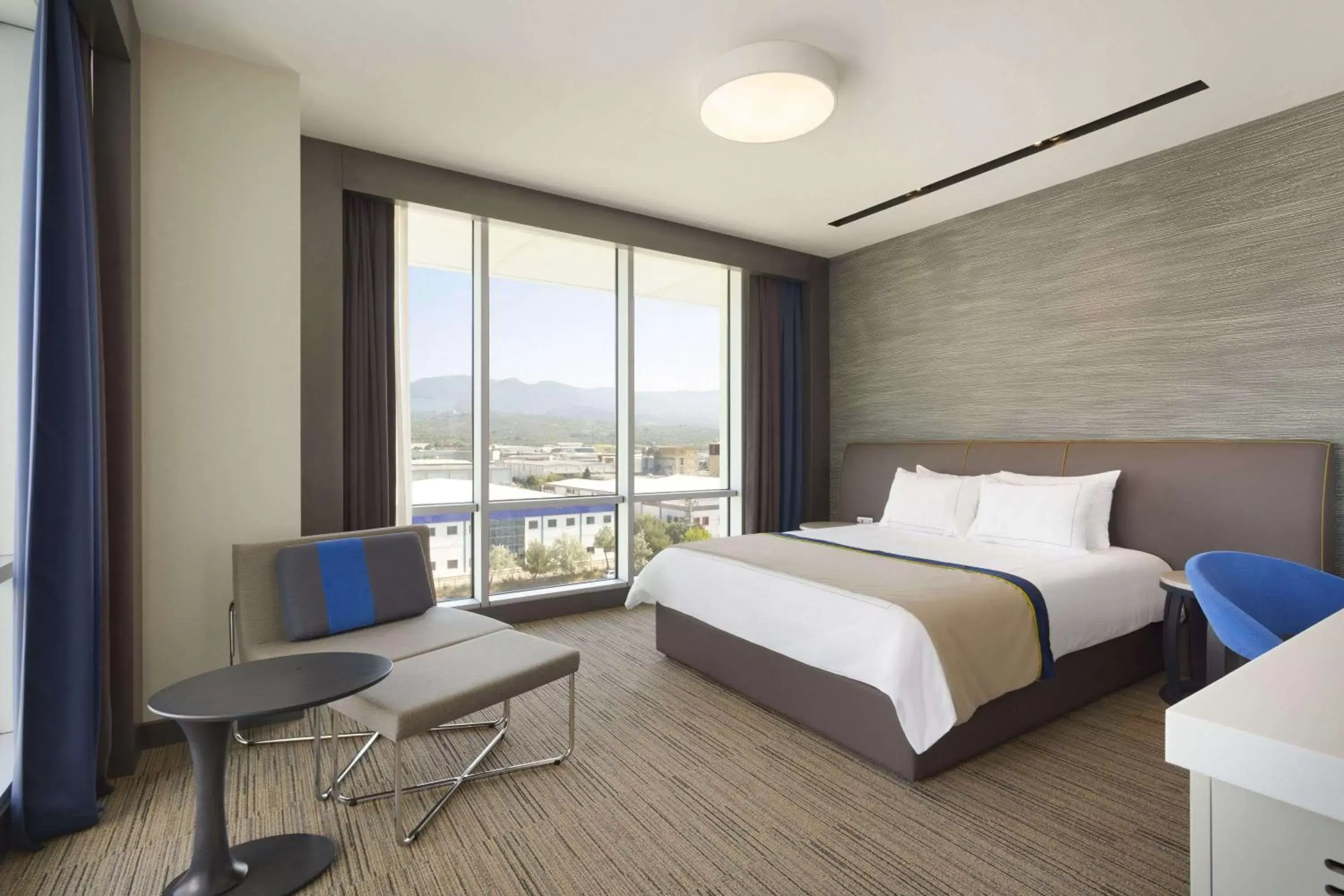 Photo of the whole room, Bed in Ramada Hotel & Suites by Wyndham Izmir Kemalpasa Photo of the whole room, Bed in Ramada Hotel & Suites by Wyndham Izmir Kemalpasa