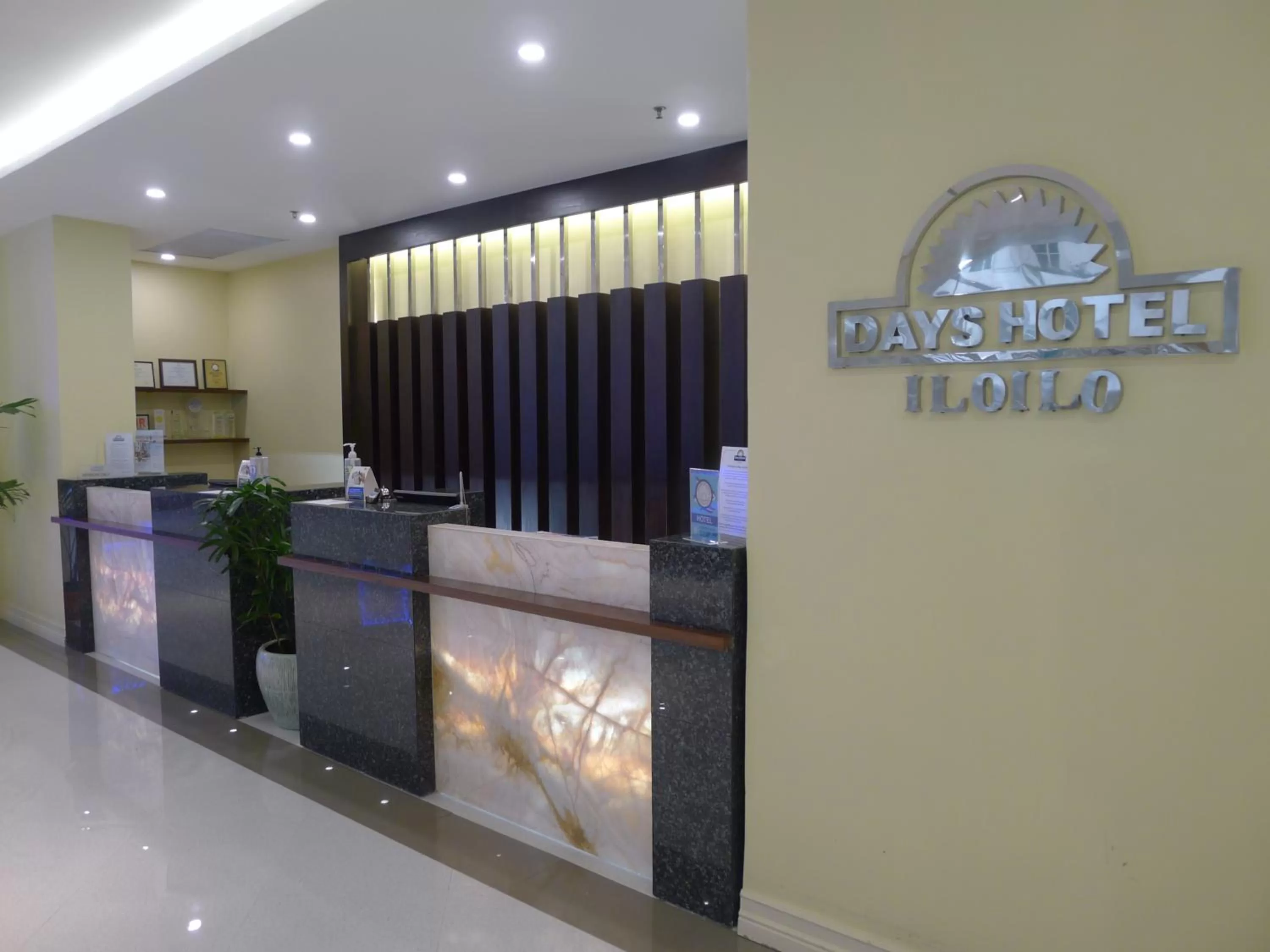 Property logo or sign in Days Hotel by Wyndham Iloilo