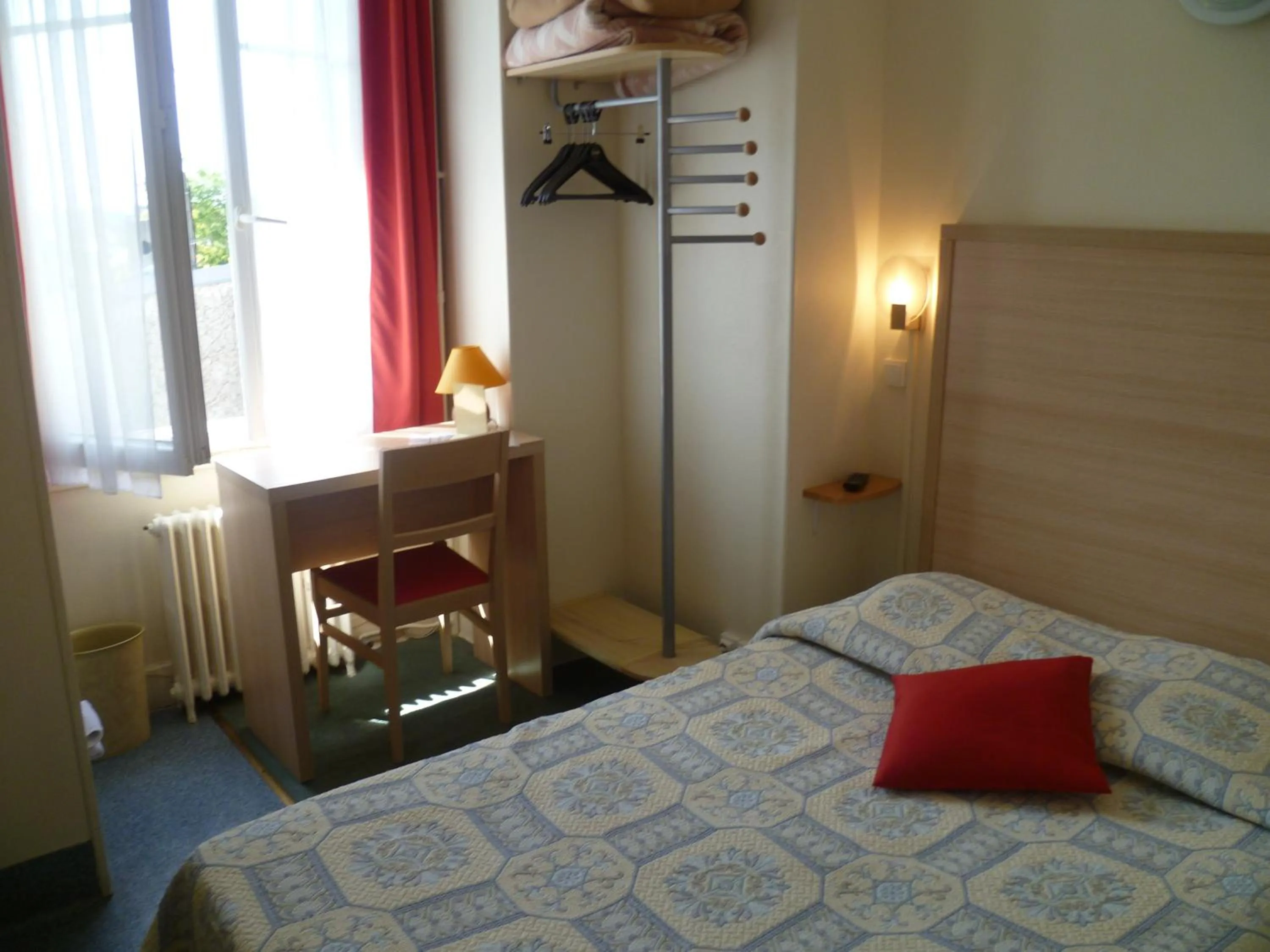 Bed in Hôtel Beauséjour