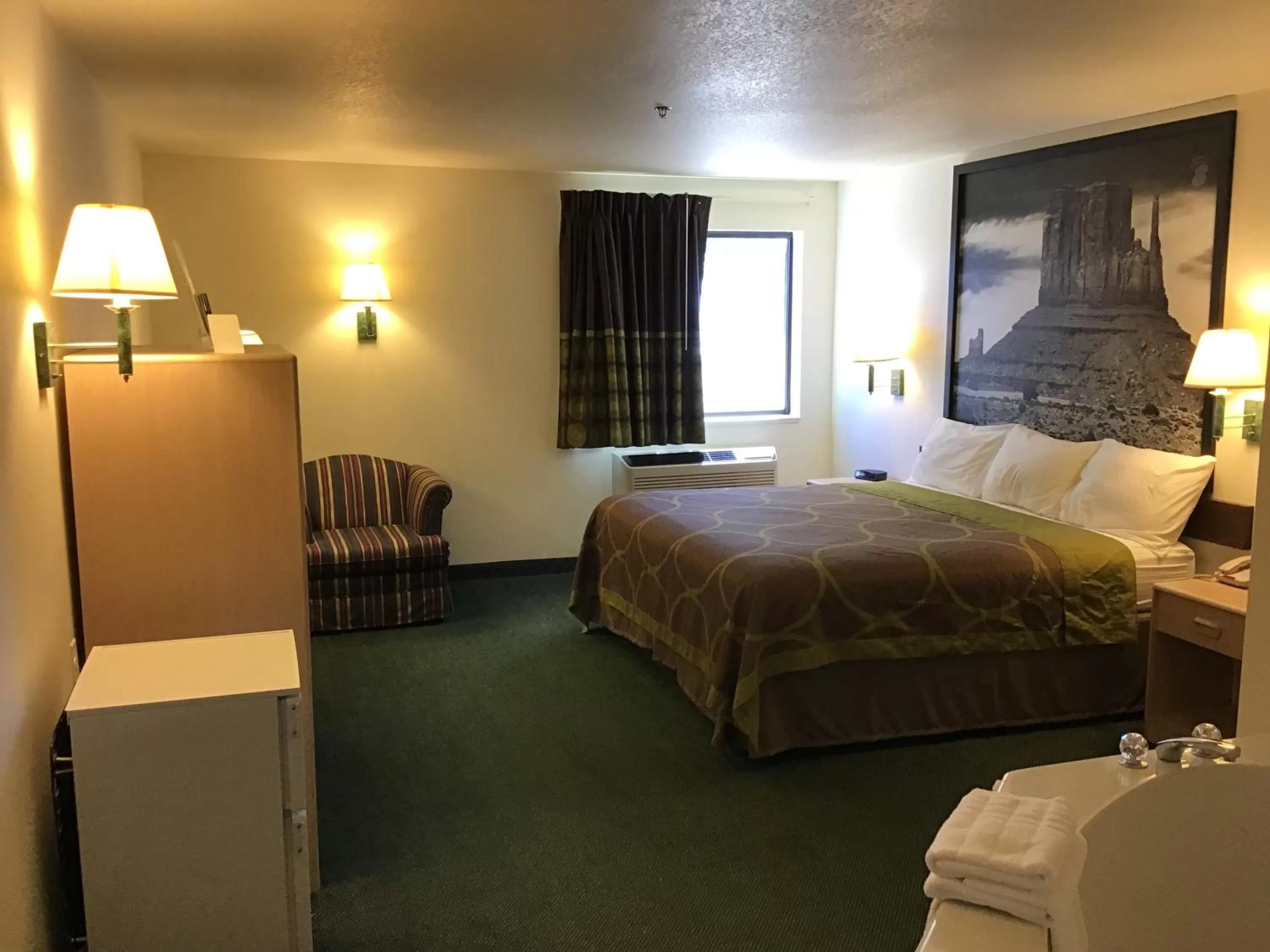 Bed in Arch Canyon Inn