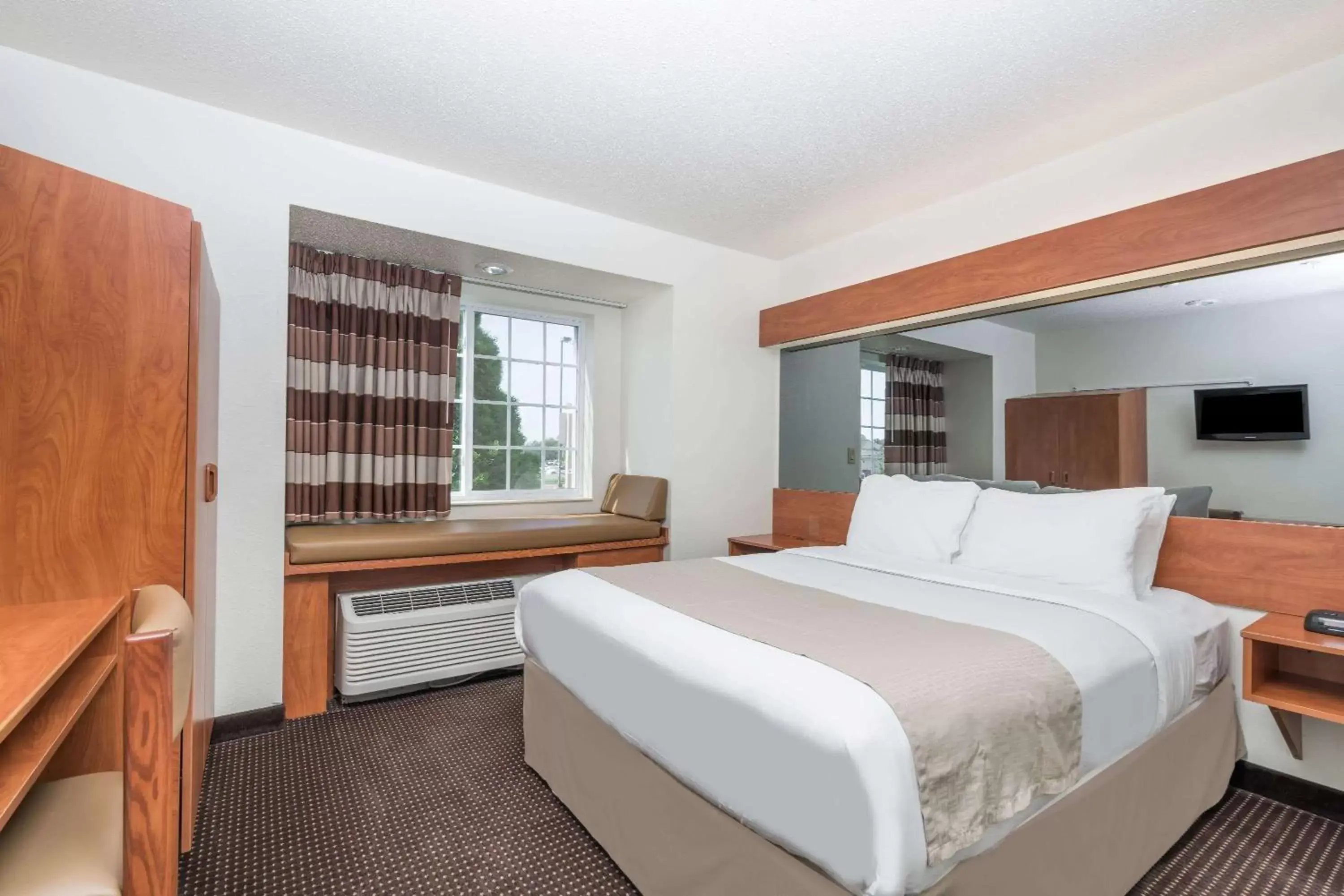 Photo of the whole room, Bed in Microtel Inn & Suites by Wyndham Rice Lake