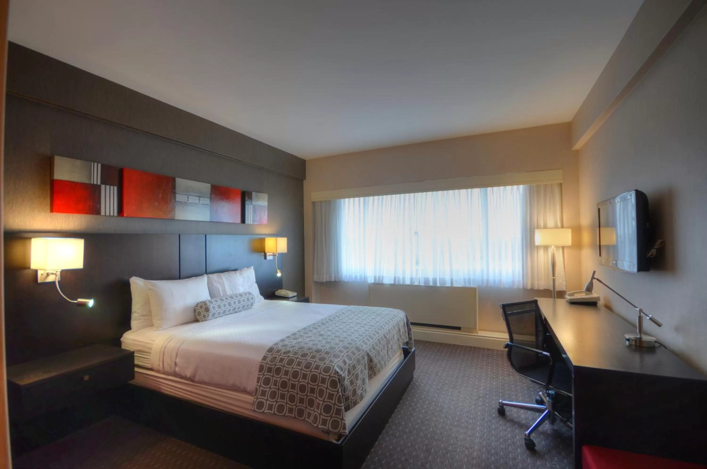 Photo of the whole room in Armon Plaza Montreal Airpt, Trademark Collection by Wyndham