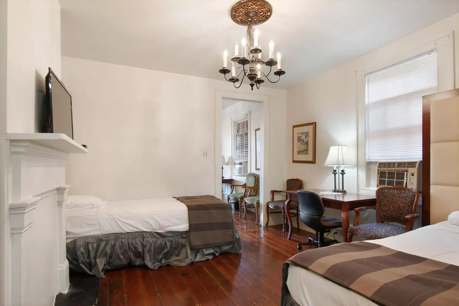 Bed in Historic Mardi Gras Inn Bed in Historic Mardi Gras Inn