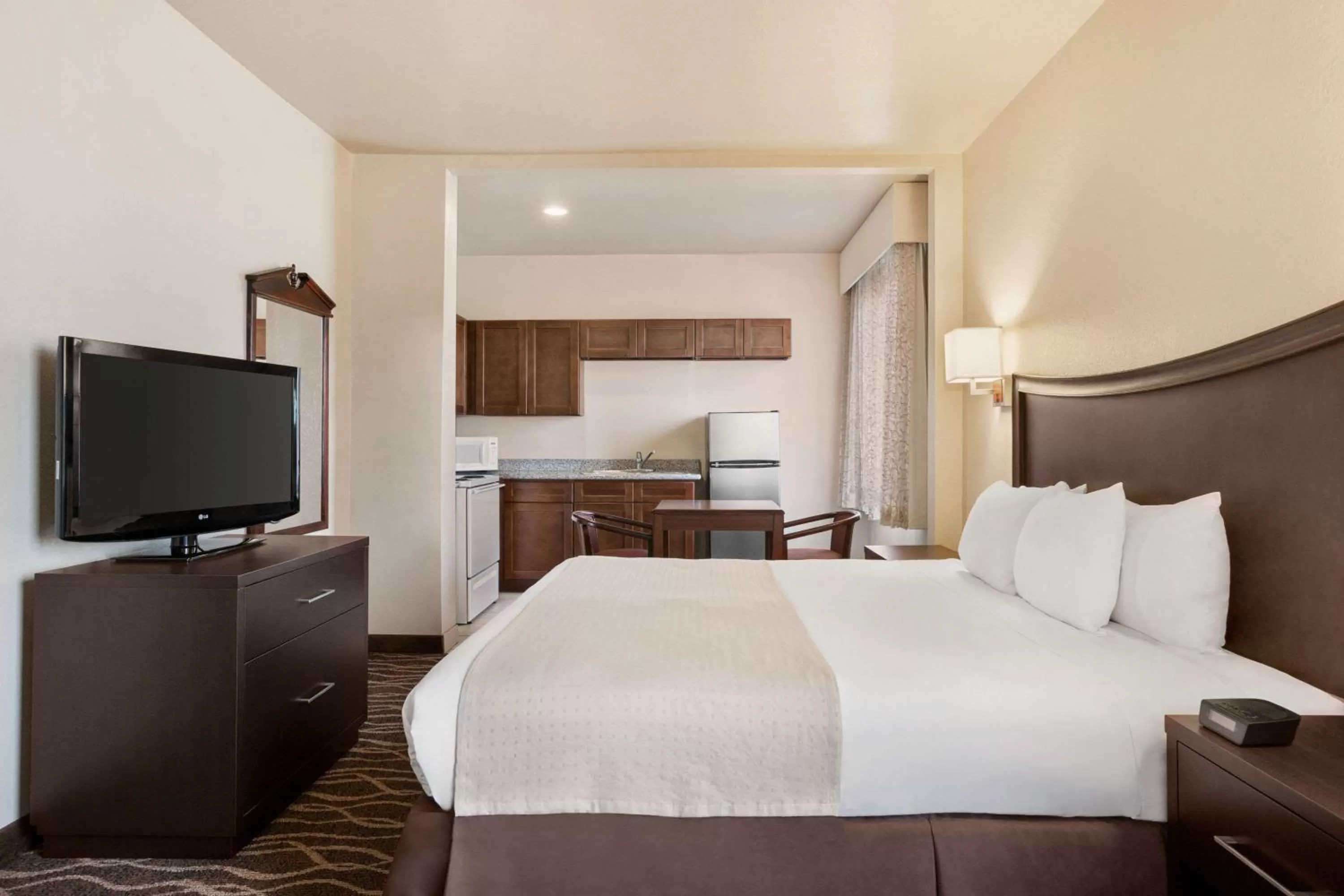 Photo of the whole room, Bed in Baymont by Wyndham Clute Lake Jackson