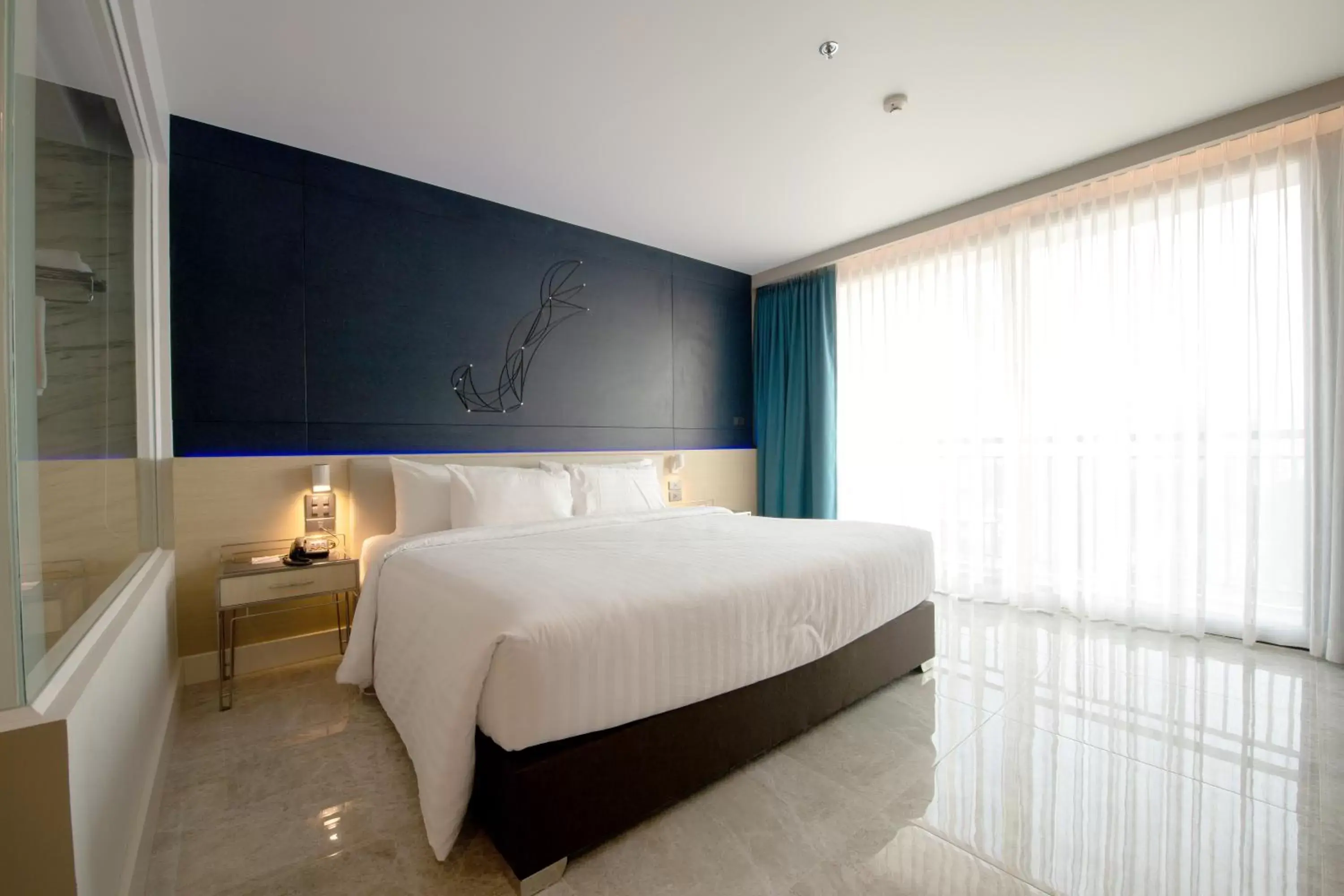 Bed in Pattaya Discovery Beach Hotel - SHA Extra Plus