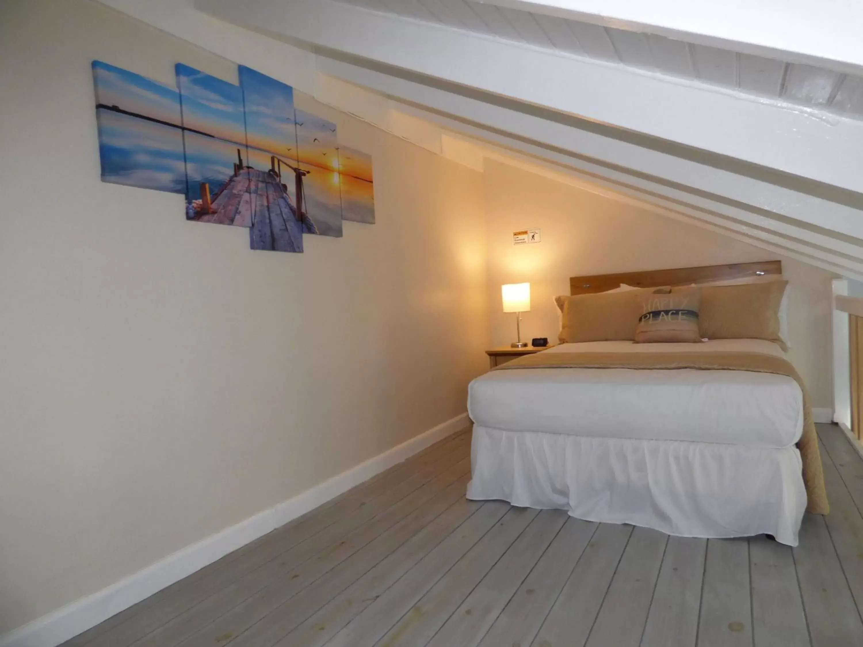 Bed in Beach Two Bedroom Loft Suite E29