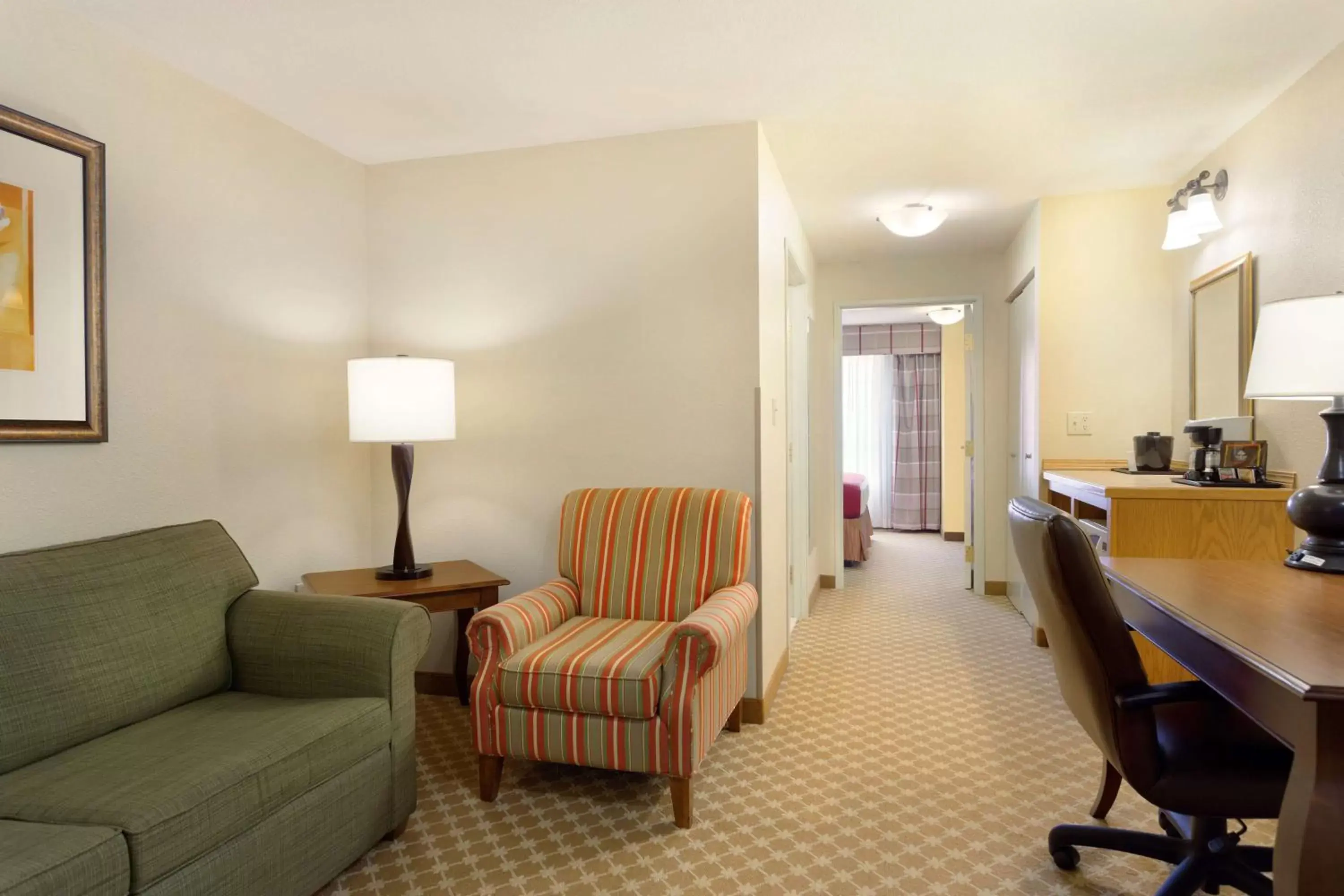 Photo of the whole room, Seating Area in Country Inn & Suites by Radisson, Nevada, MO