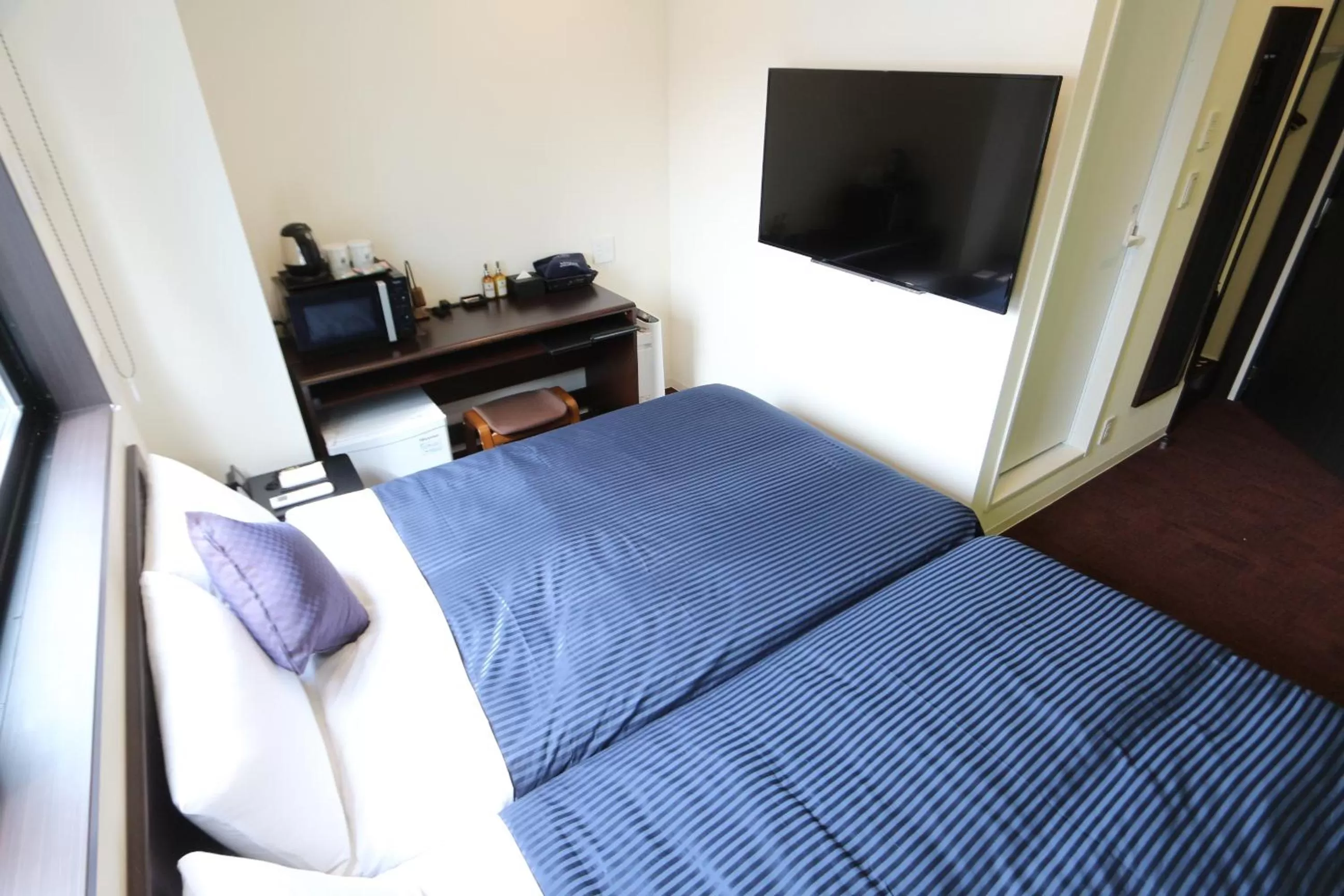 Bed in HOTEL LiVEMAX Ueno-Ekimae