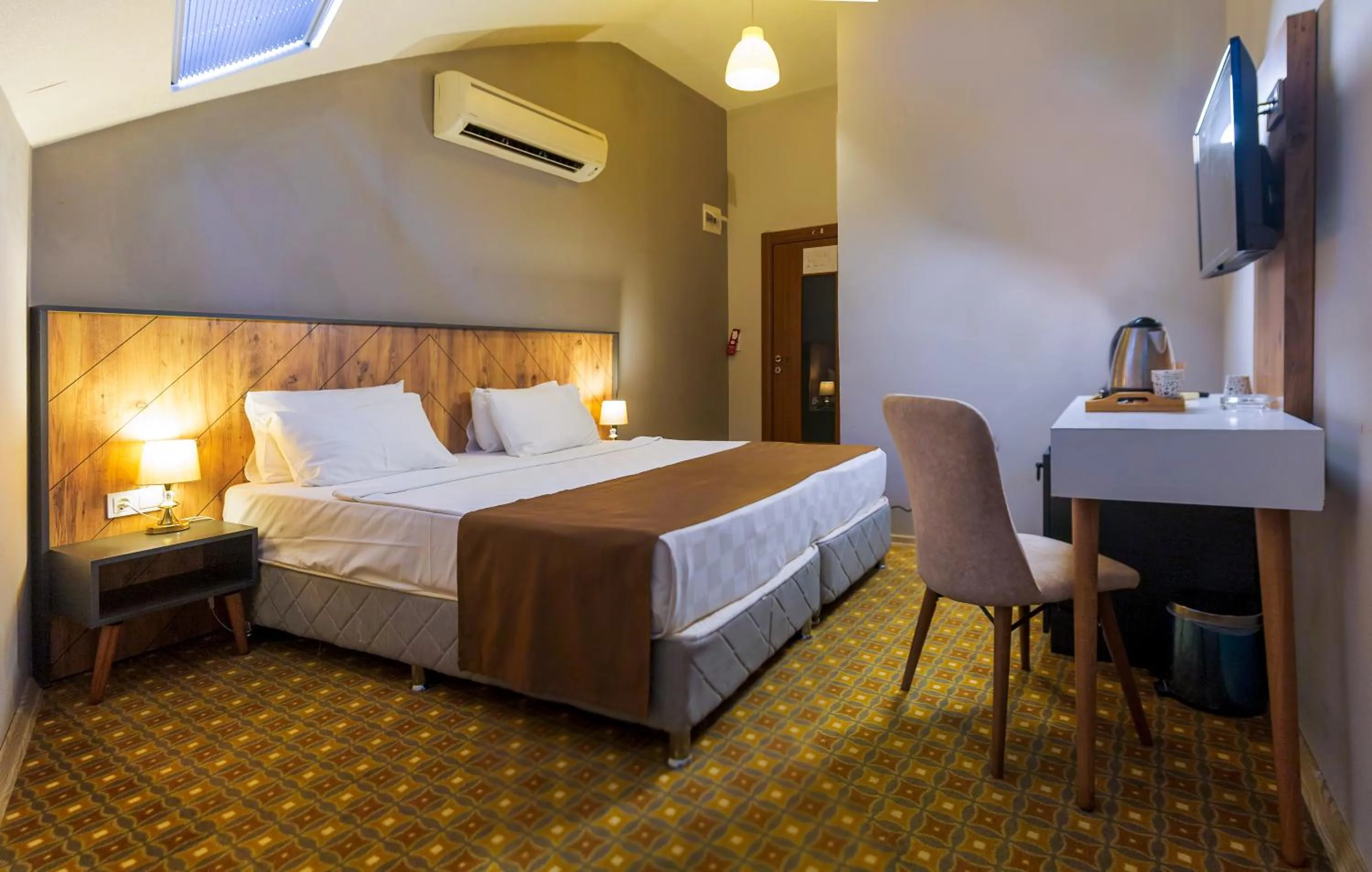 Bed in PRIVADO HOTELS