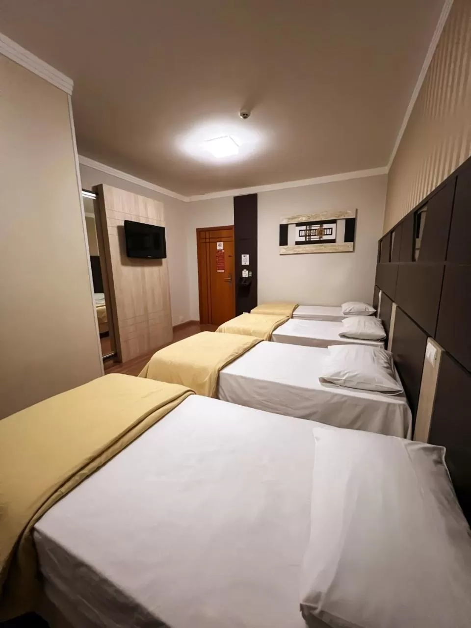 Bed in Paraná Comfort Hotel