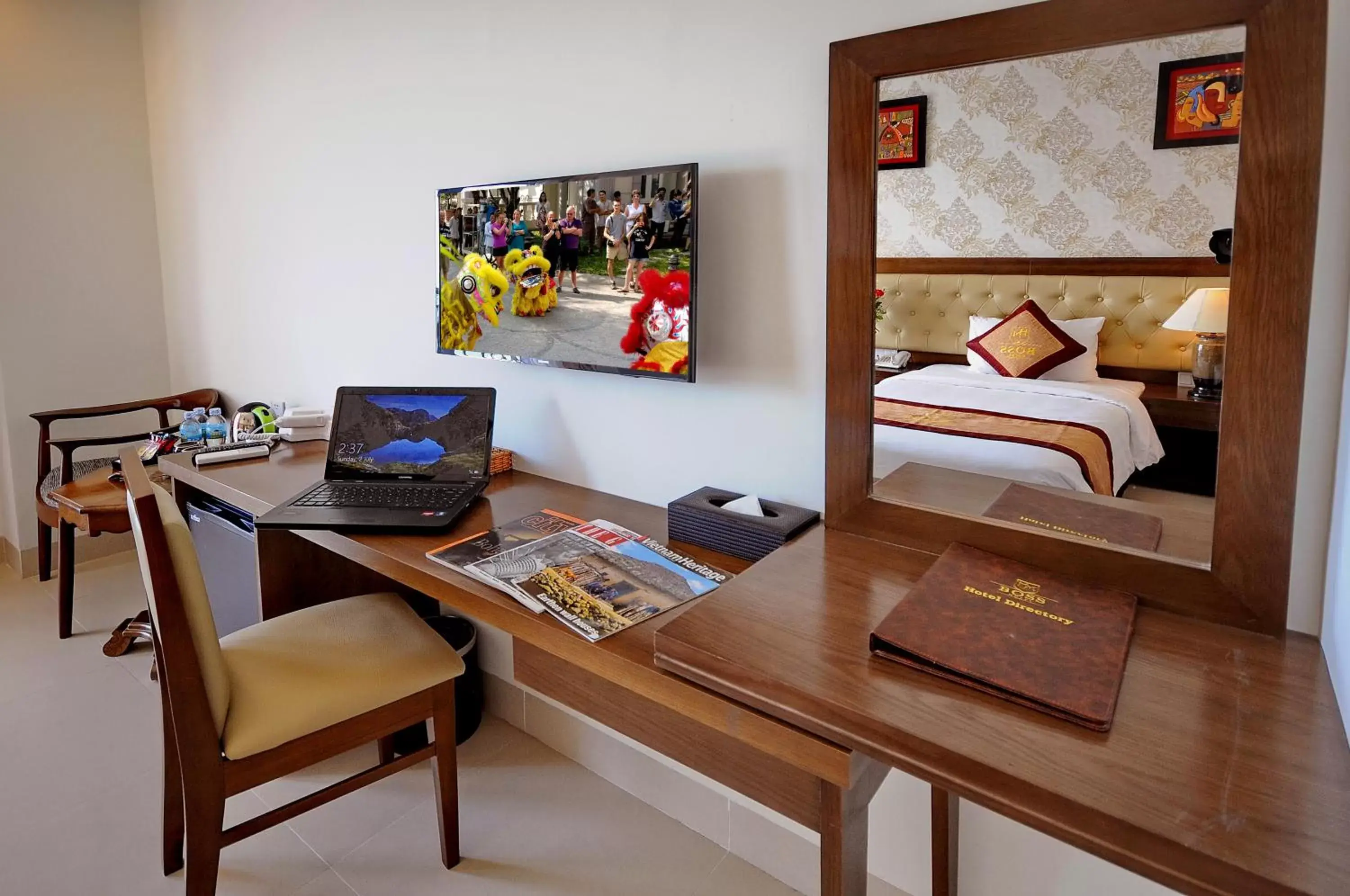 Photo of the whole room, TV/Entertainment Center in Boss Hotel