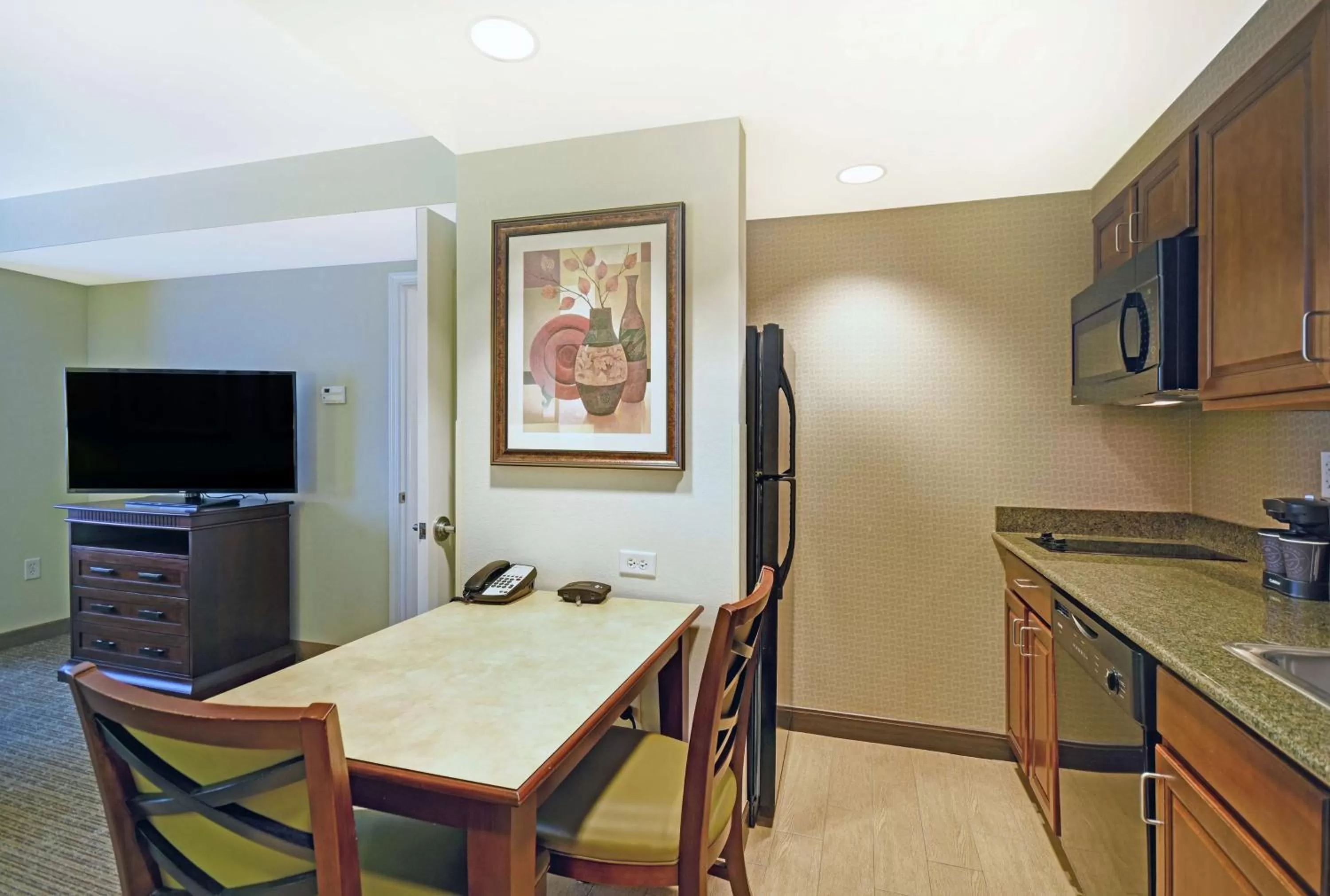 Bedroom in Homewood Suites by Hilton Denver International Airport