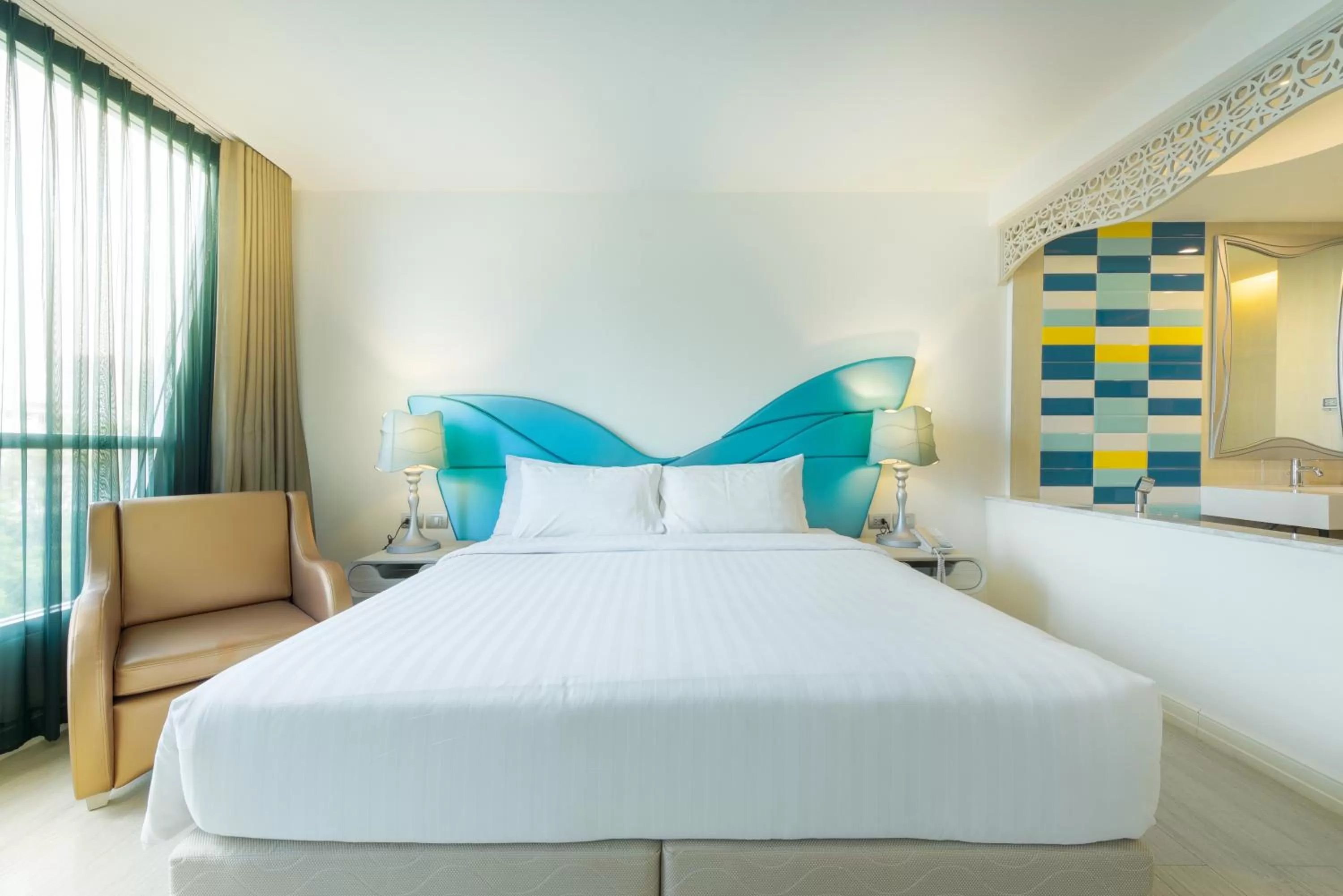 Bed in Le Tada Parkview Hotel