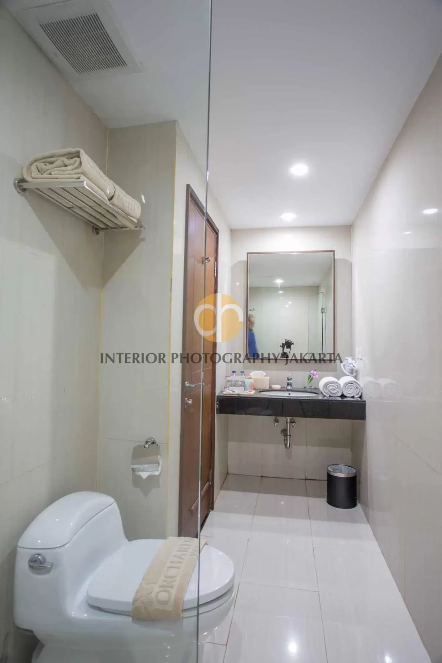 Bathroom in Orchardz Hotel Bandara