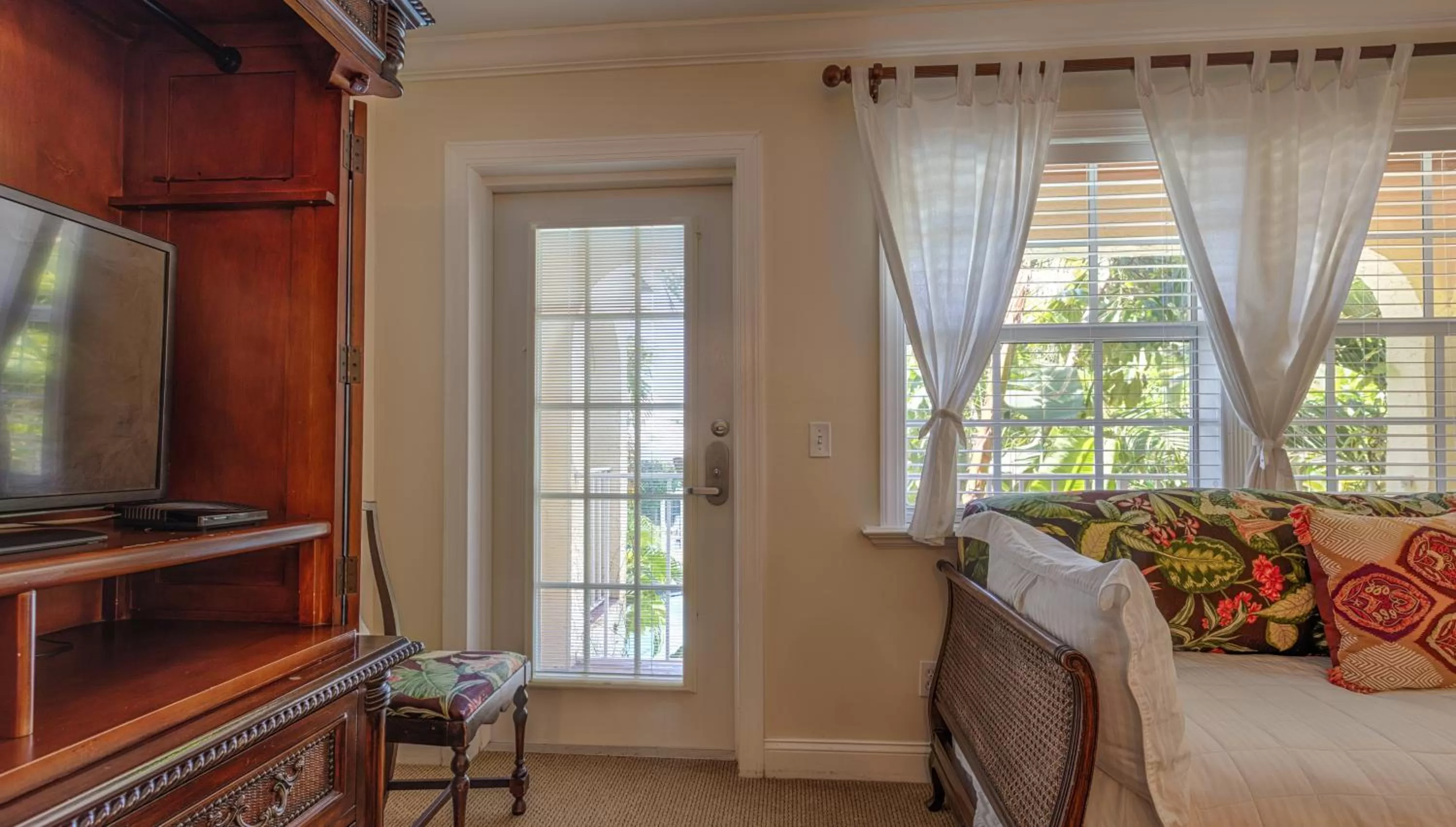 Bedroom in The Caribbean Court Boutique Hotel