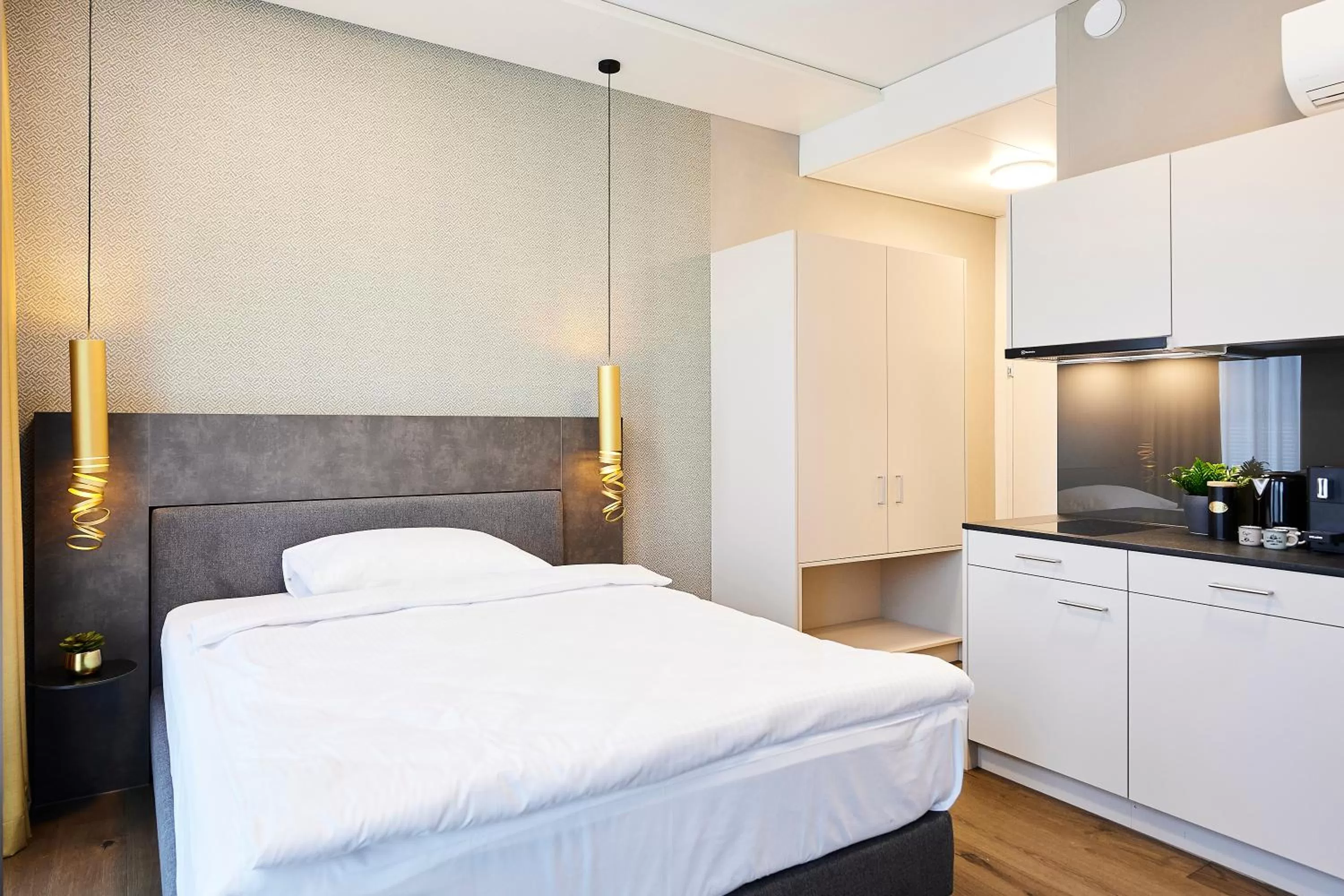 Bed in Lumen Apartments