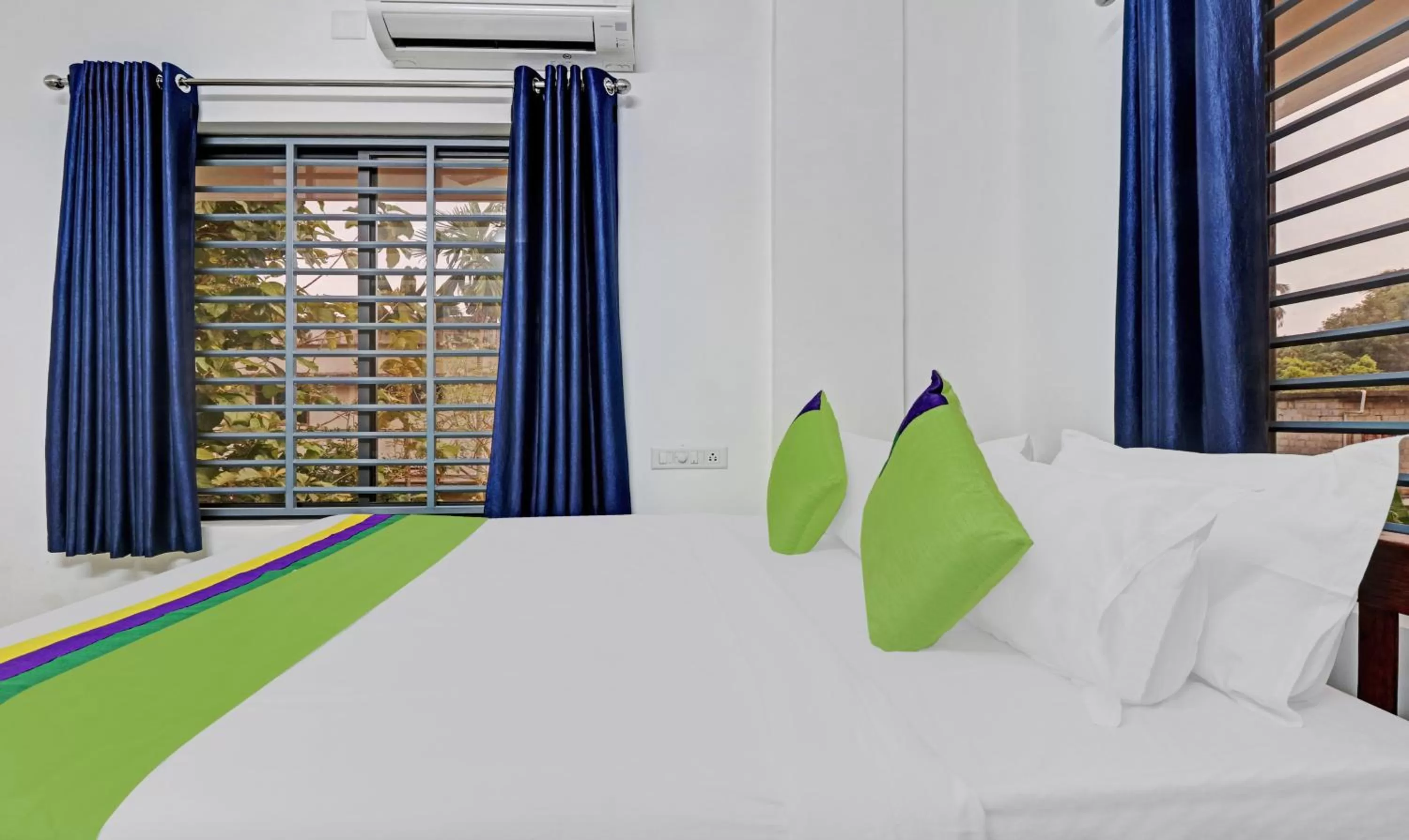 Bedroom, Bed in Treebo Trend Nirupama Apartment