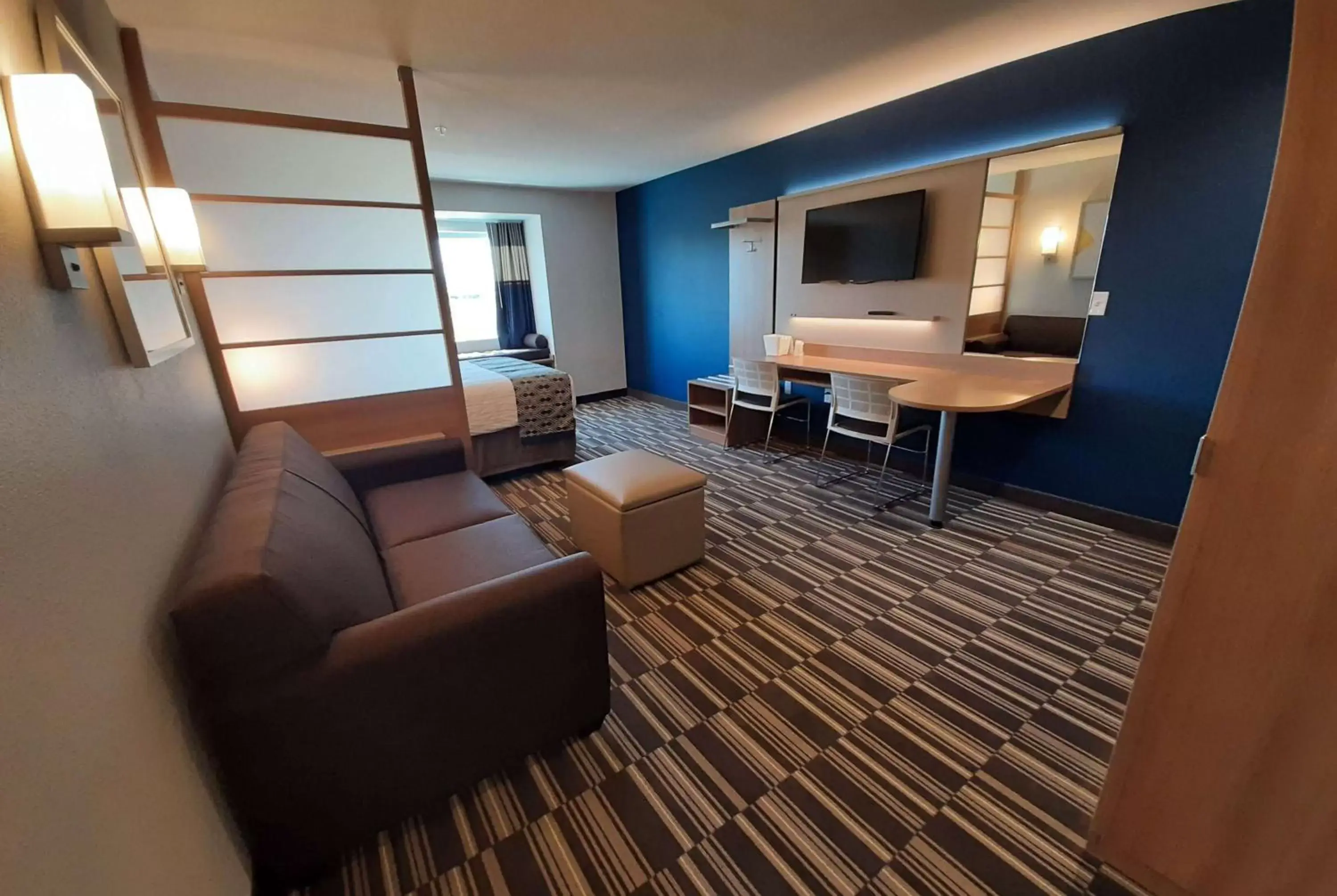 Photo of the whole room, Seating Area in Microtel Inn & Suites by Wyndham Loveland