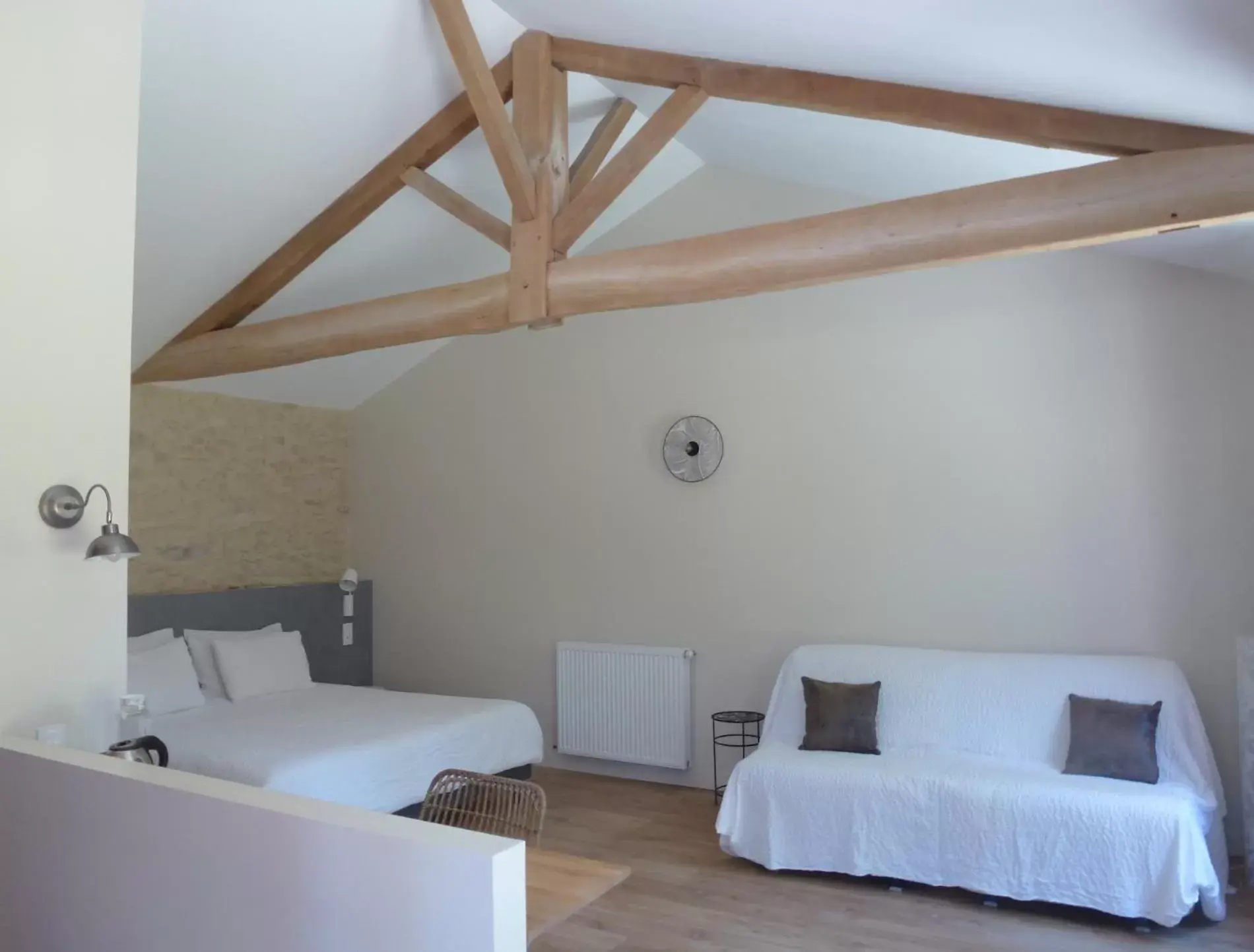 Bedroom, Seating Area in Au petit grain