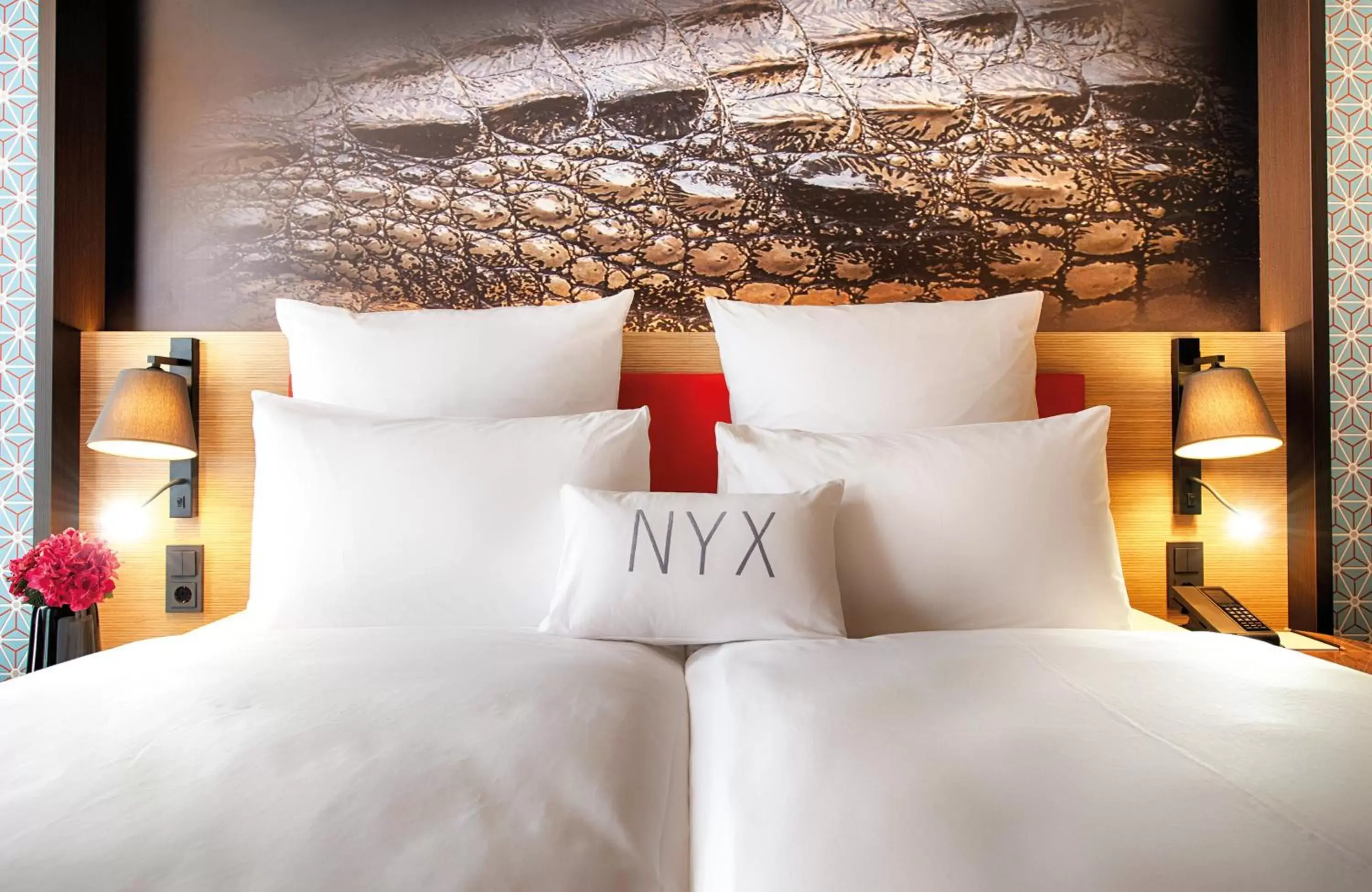 Photo of the whole room, Bed in NYX Hotel Munich by Leonardo Hotels