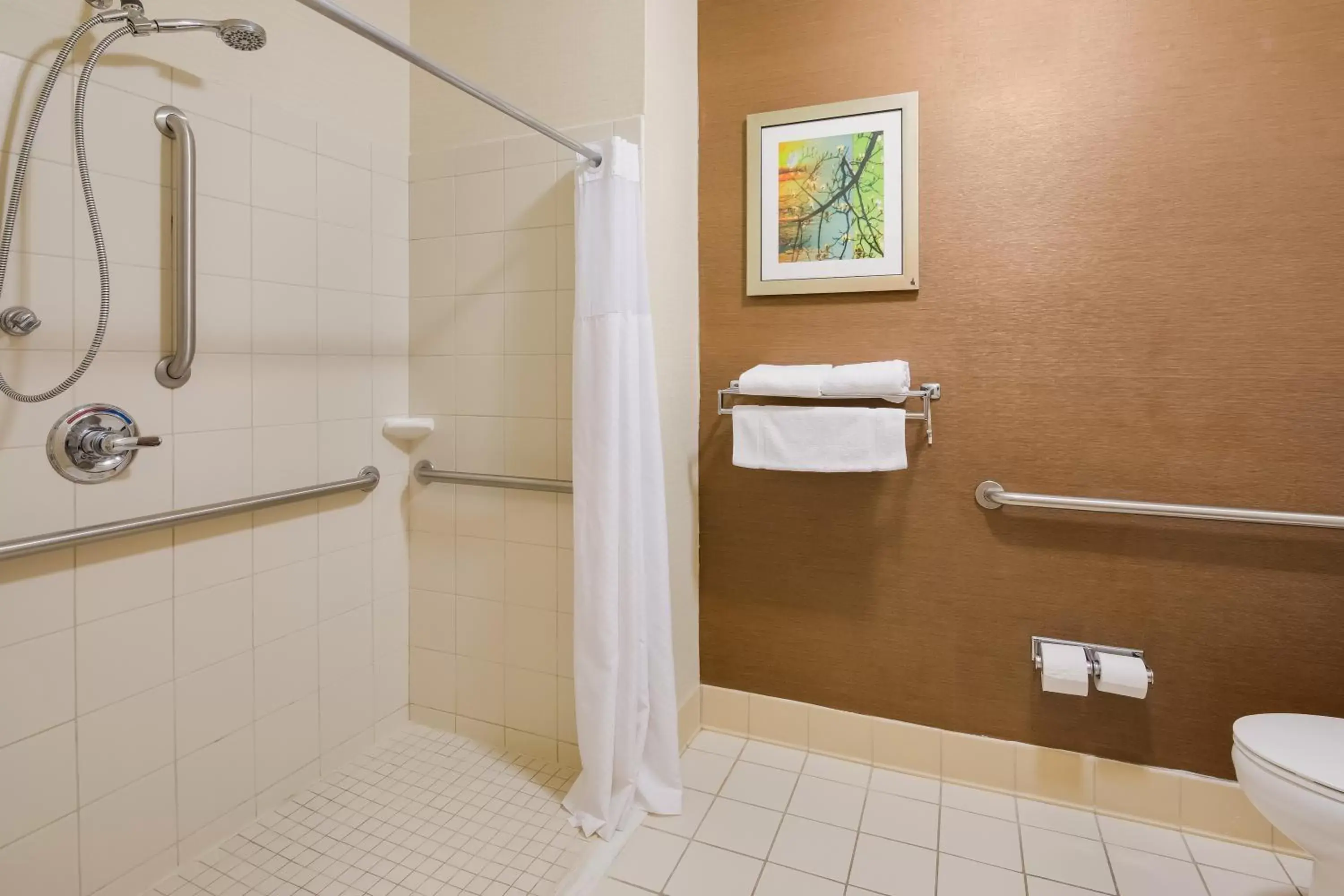 Bathroom in SureStay Plus Hotel by Best Western Minot